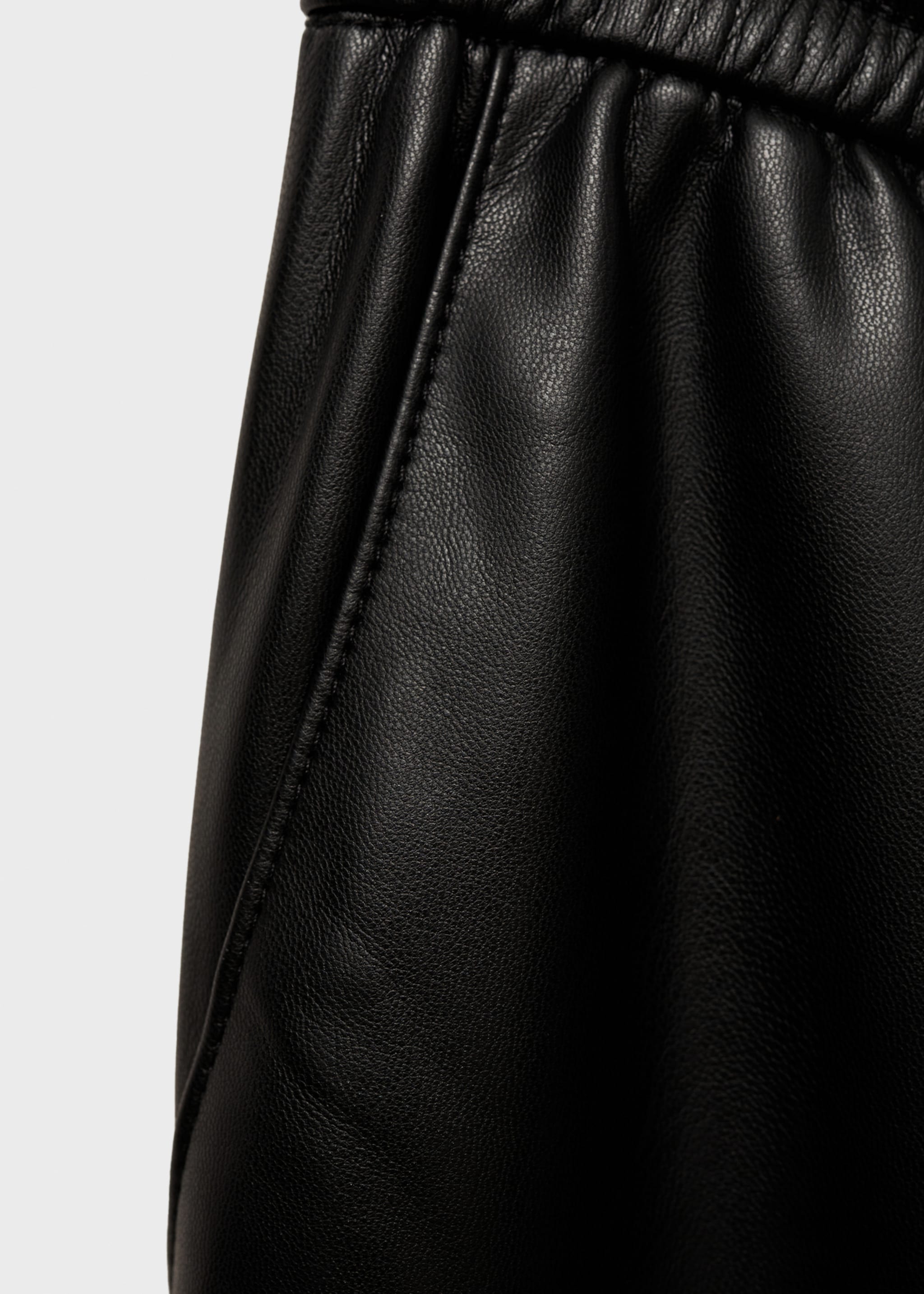 Leather-effect elastic waist trousers - Details of the article 0