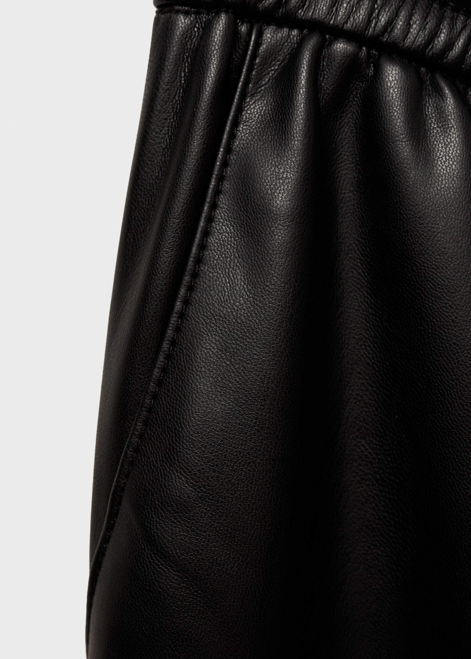 Leather-effect elastic waist trousers - Details of the article 0