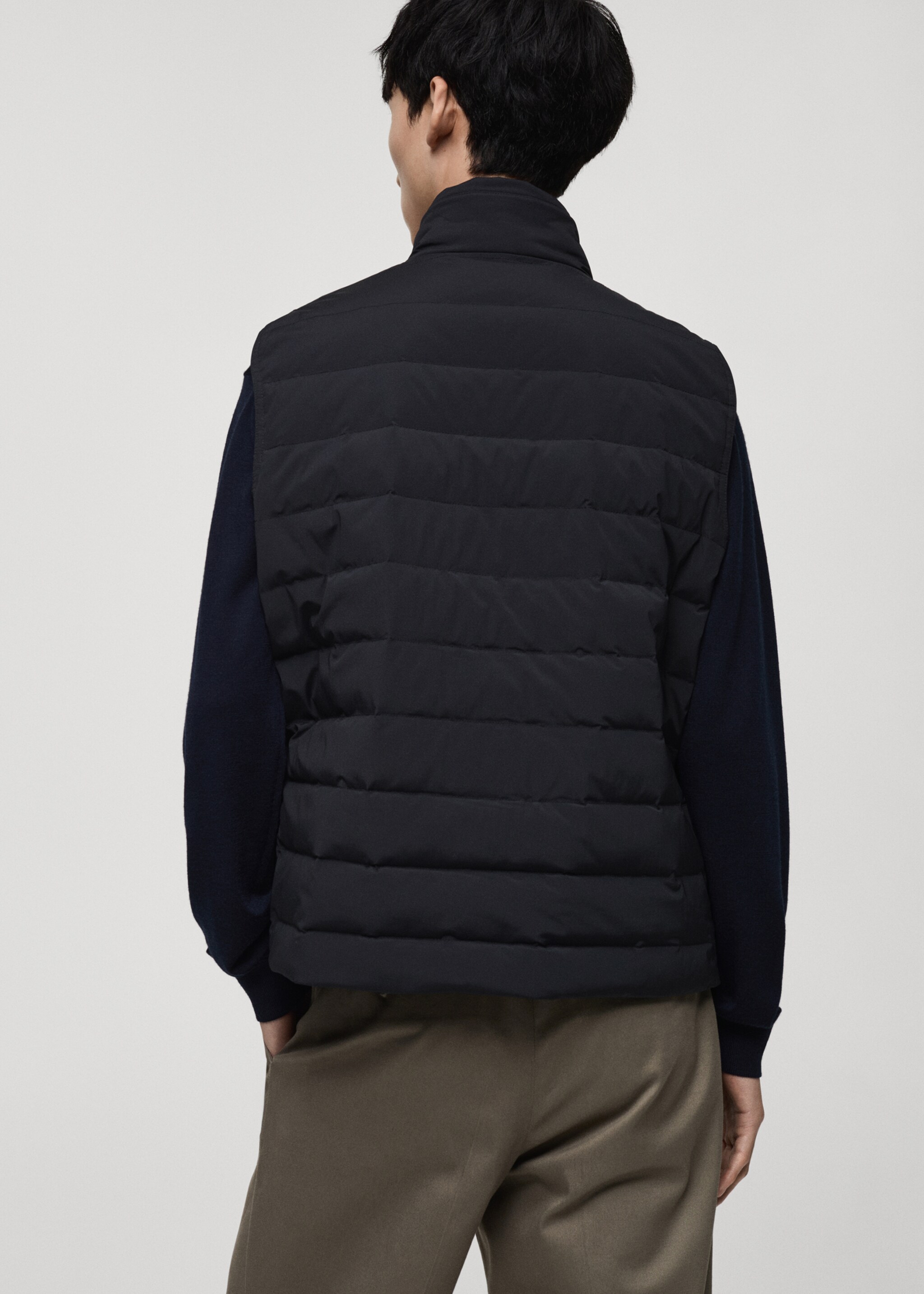 Quilted vest with down and feather filling - Reverse of the article