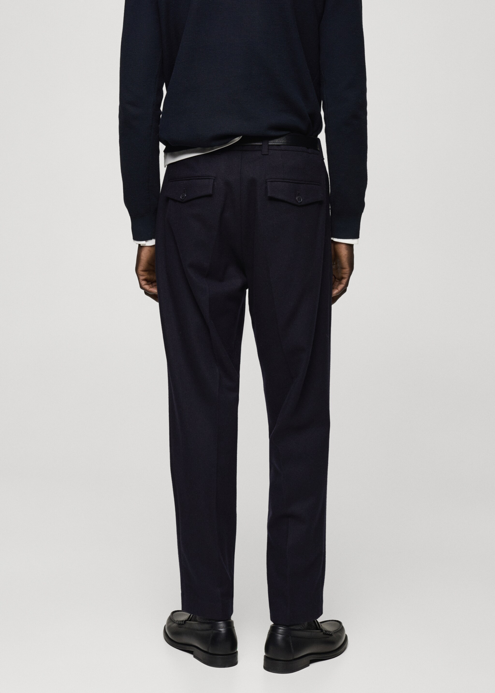 Wool flannel trousers with pleats - Reverse of the article