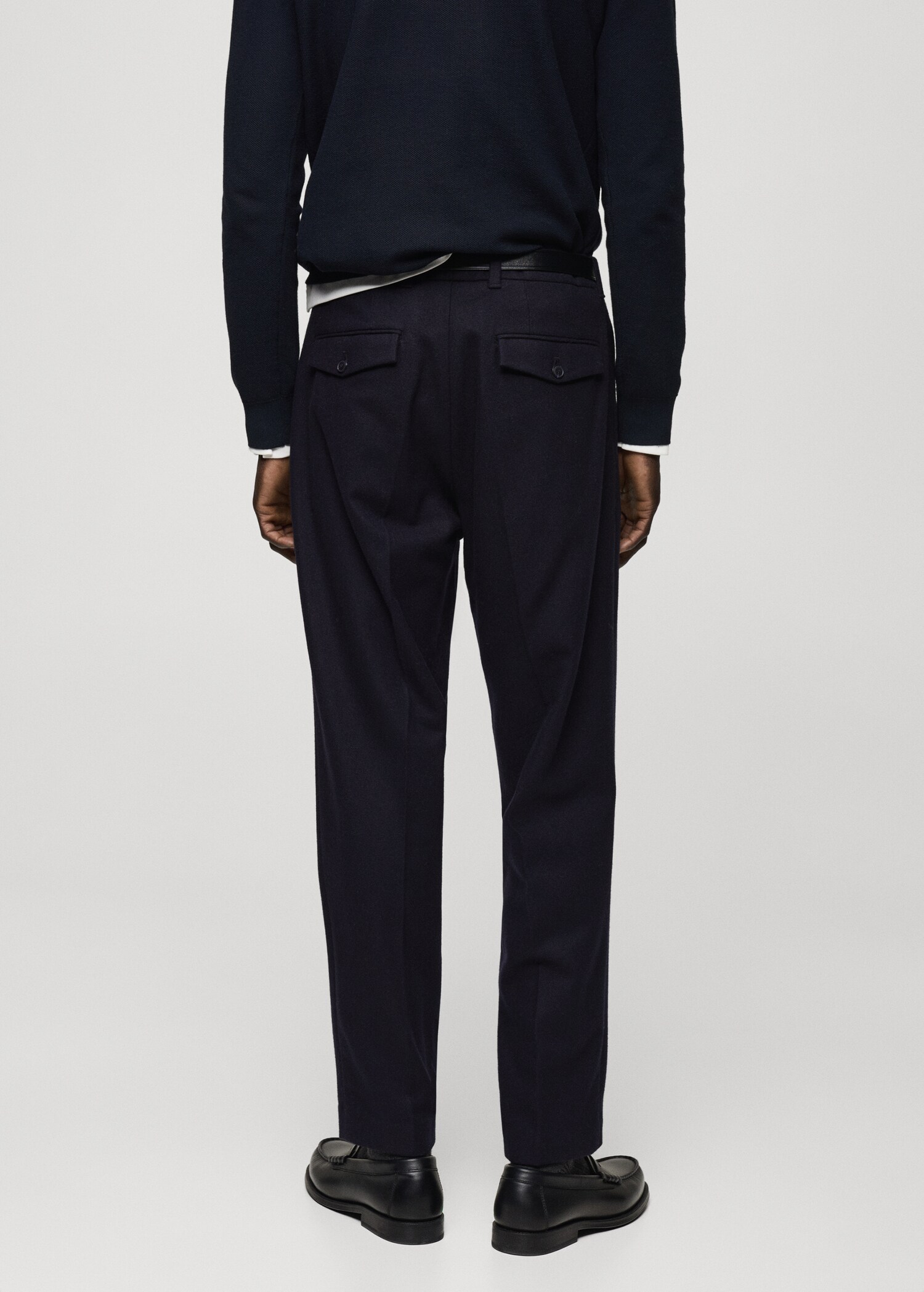 Wool flannel trousers with pleats - Reverse of the article