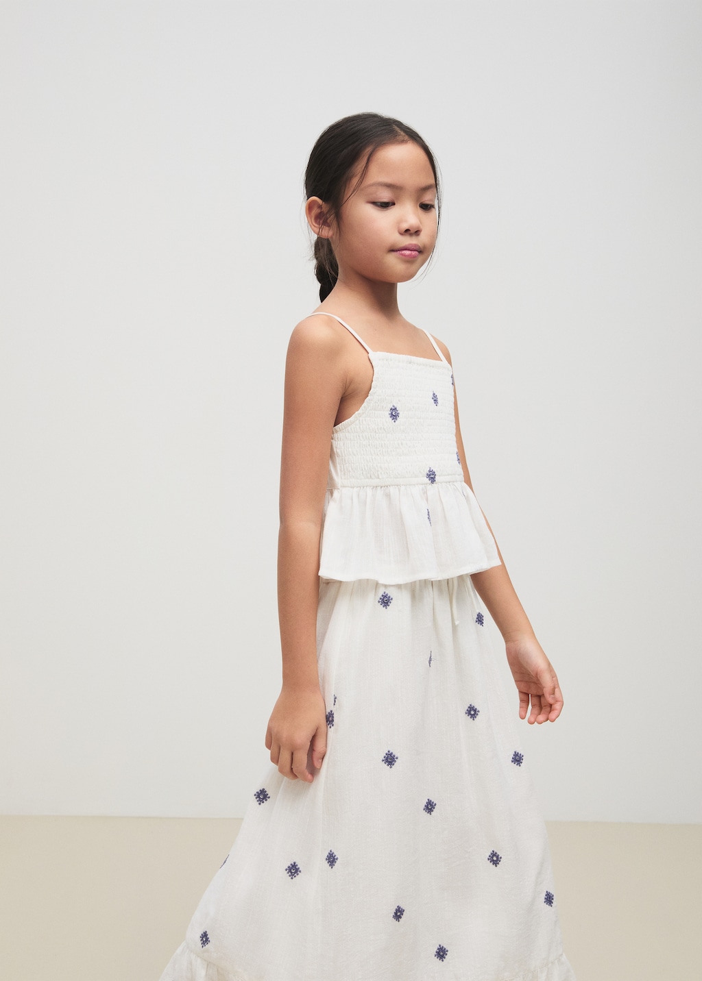 Ruffled blouse with embroidered details