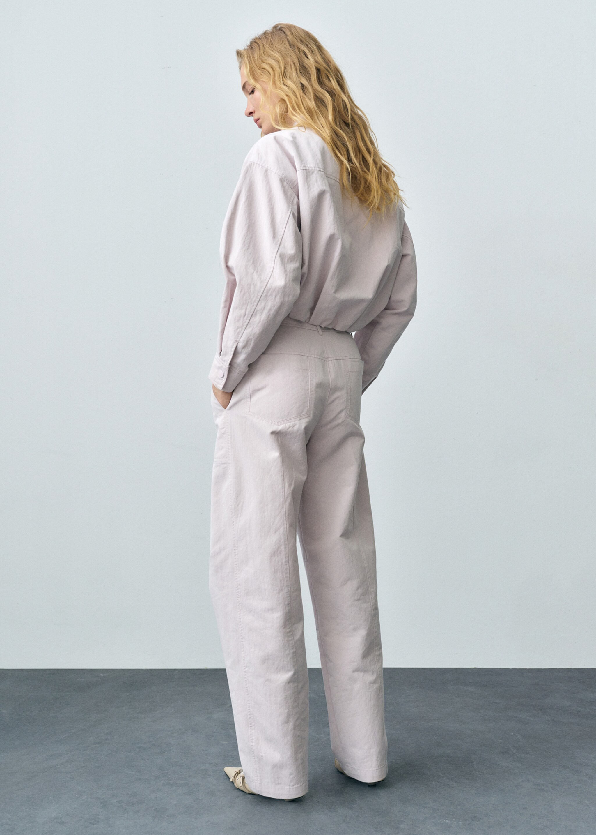 Wide-leg trousers with decorative seams - Reverse of the article