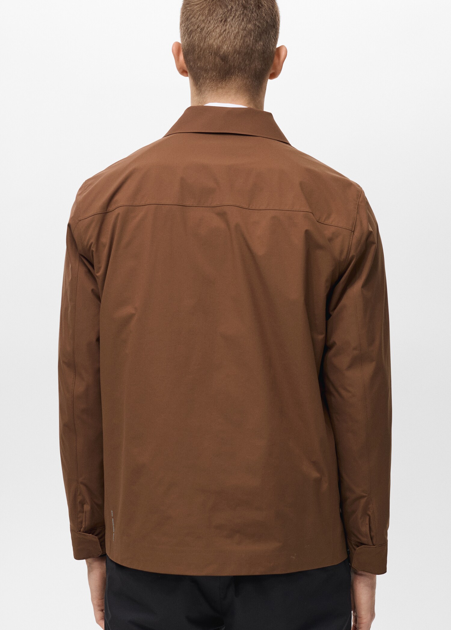 Water-repellent jacket with pockets - Reverse of the article