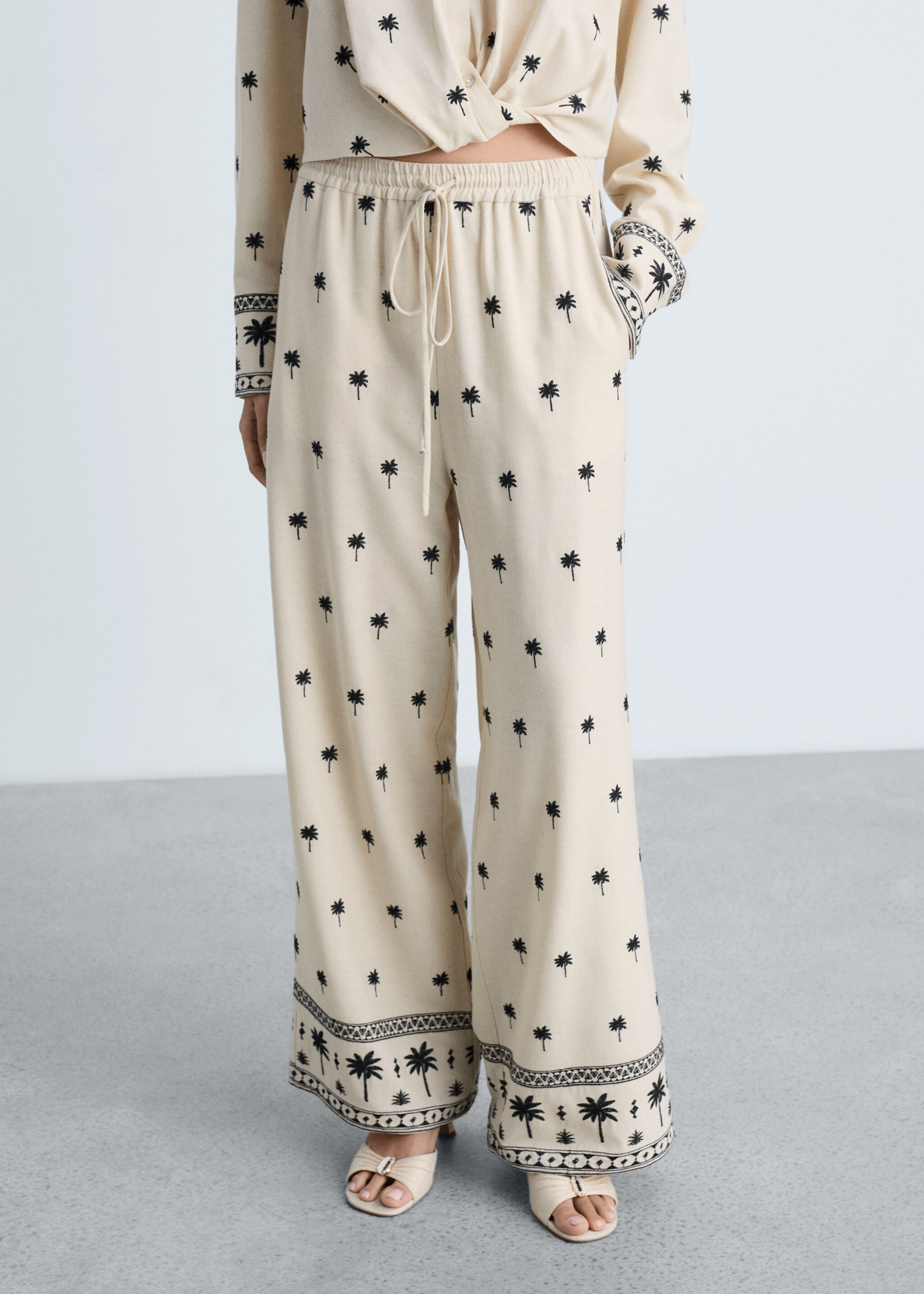 Embroidered straight-fit trousers - Medium plane