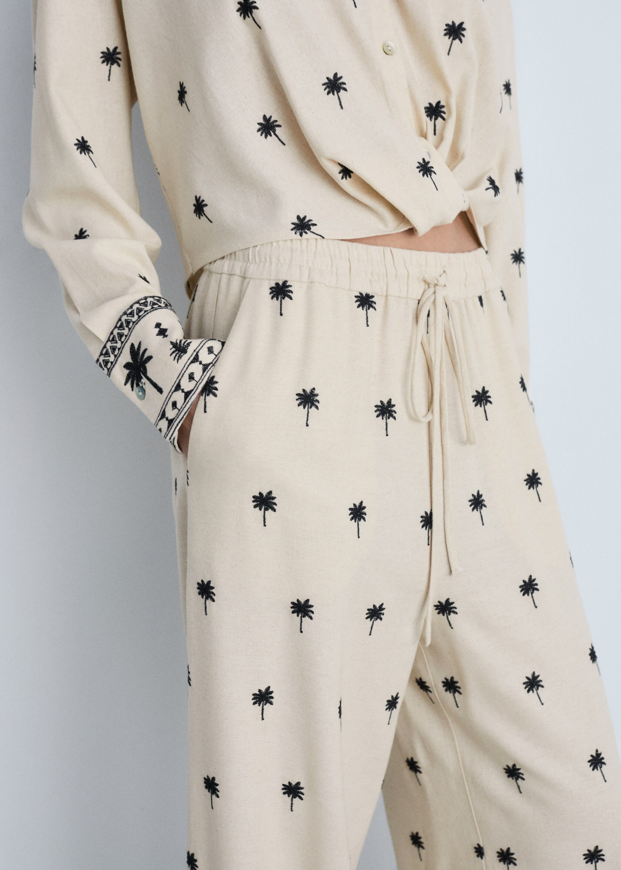 Embroidered straight-fit trousers - Details of the article 6