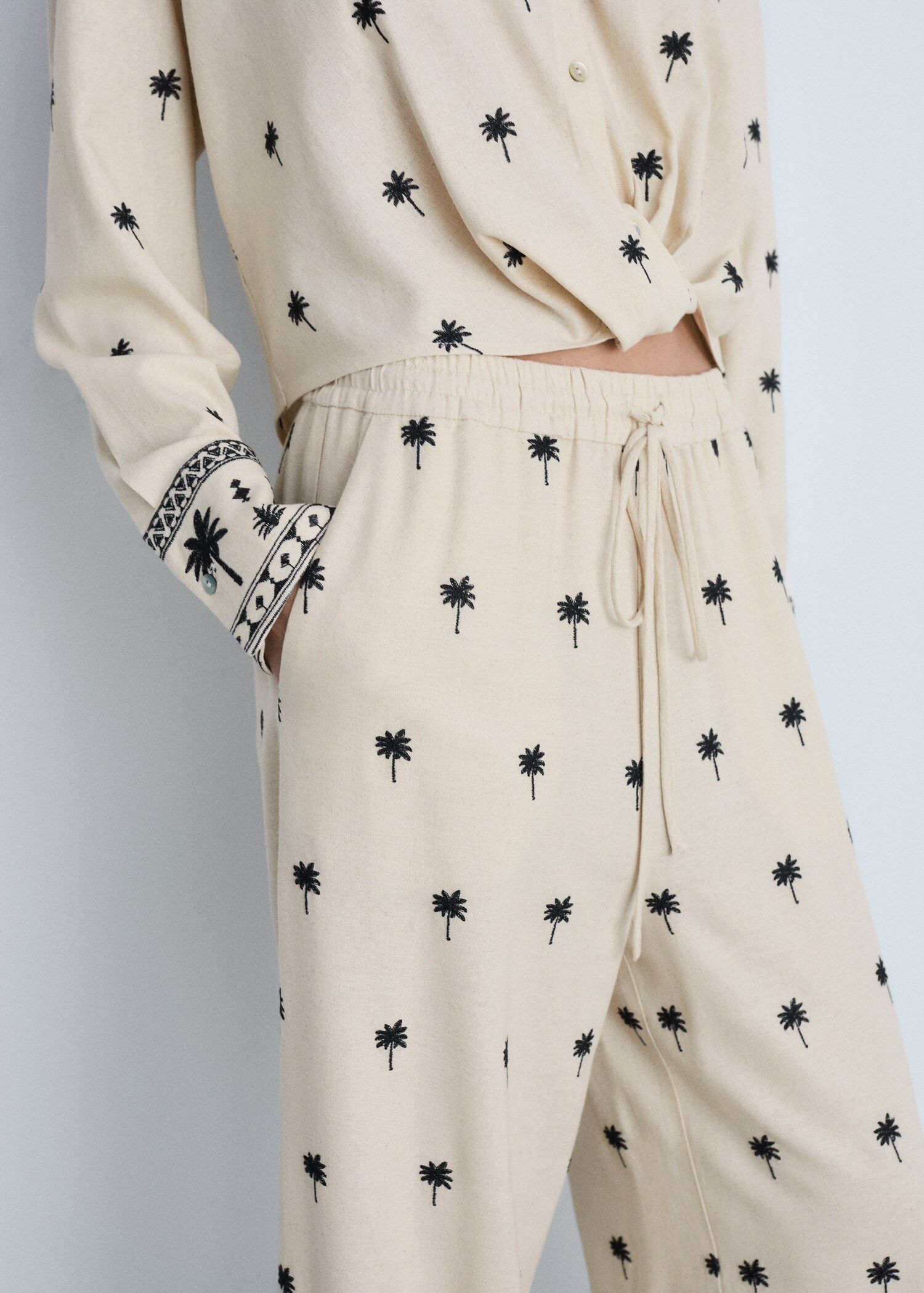 Embroidered straight-fit trousers - Details of the article 6