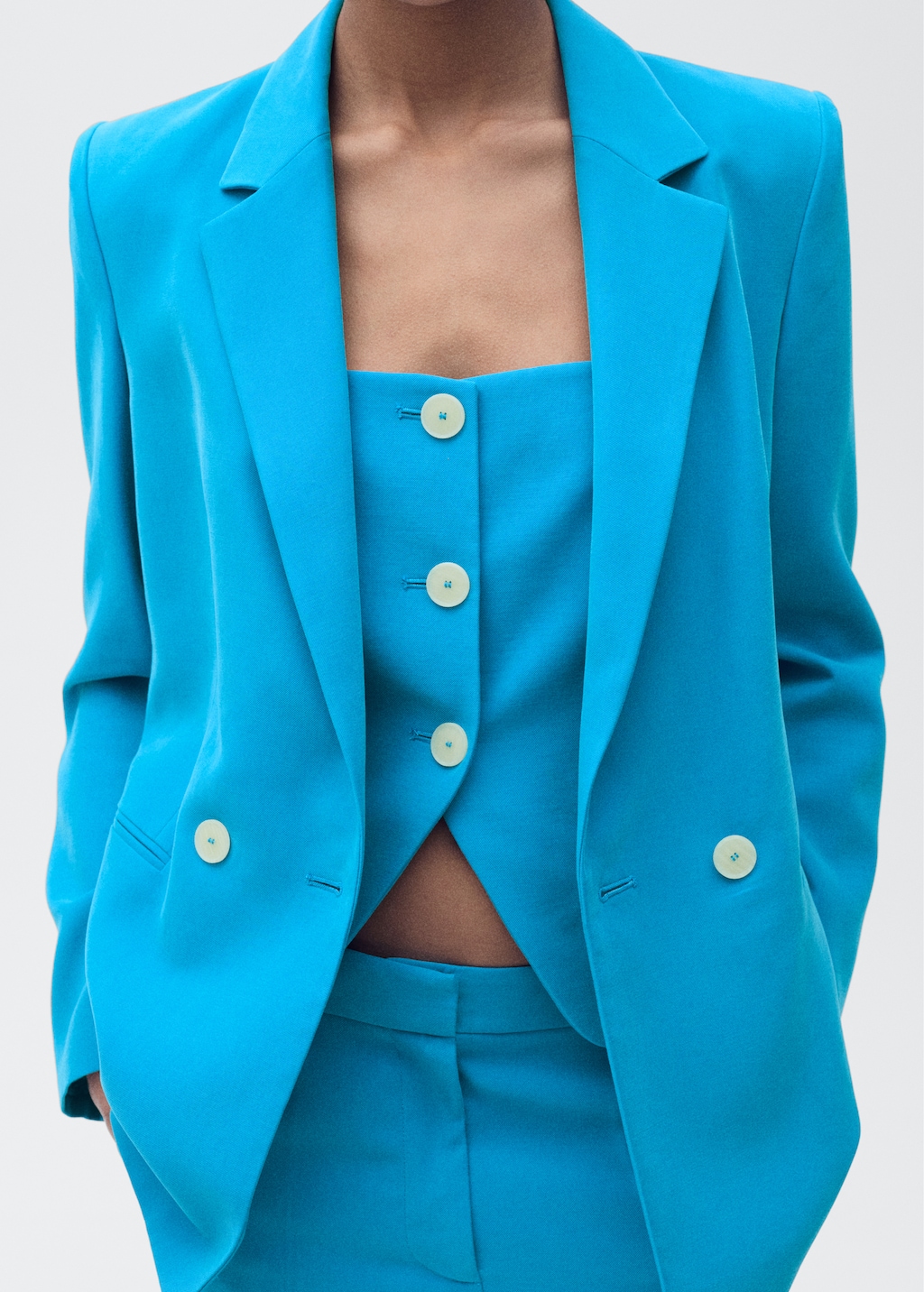 Suit vest with open back