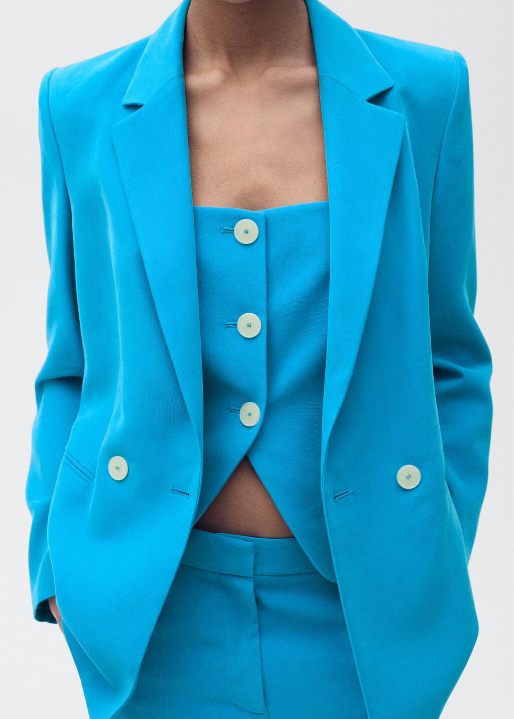 Suit vest with open back