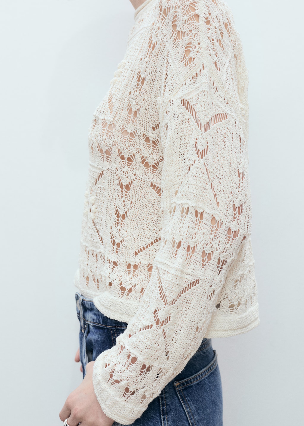 Oversized knitted sweater with lace accents