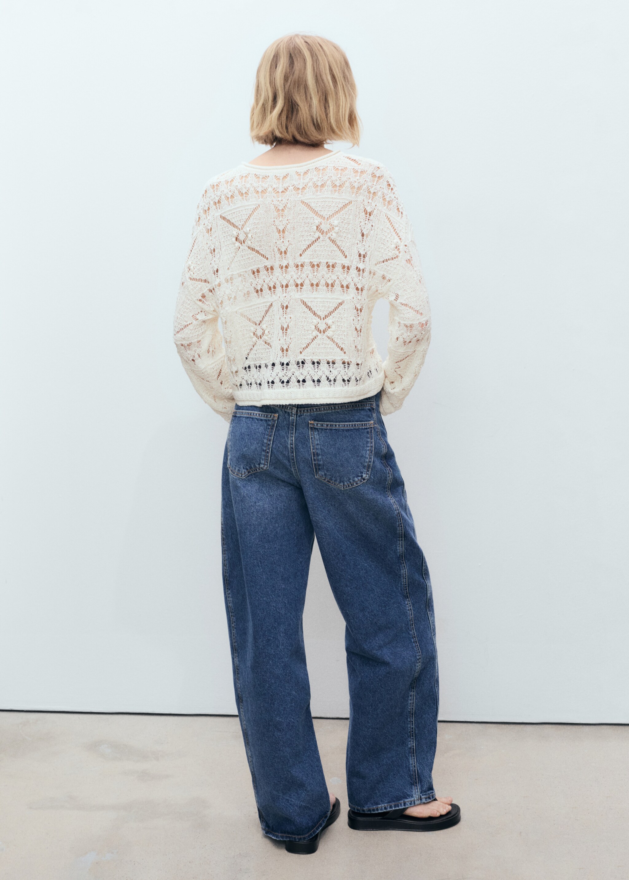 Oversized openwork knitted sweater - Reverse of the article