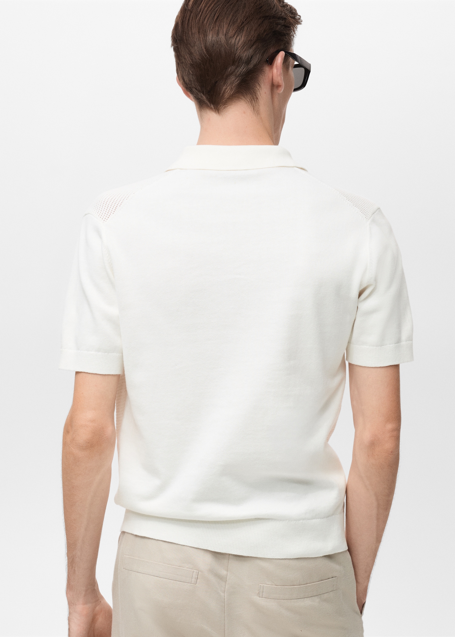 Openwork knitted polo shirt with zipper - Reverse of the article