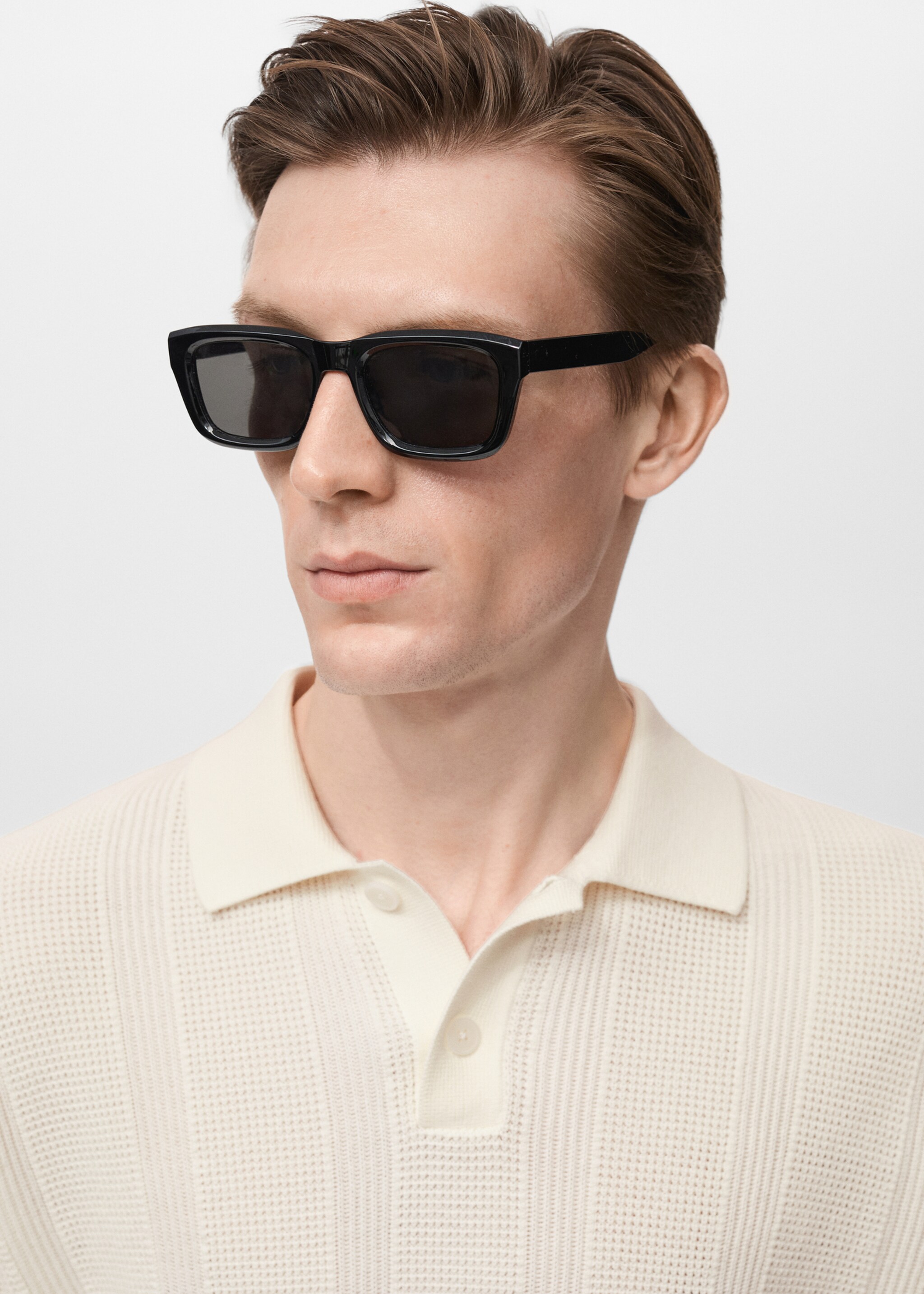 Striped openwork knitted polo shirt - Details of the article 1