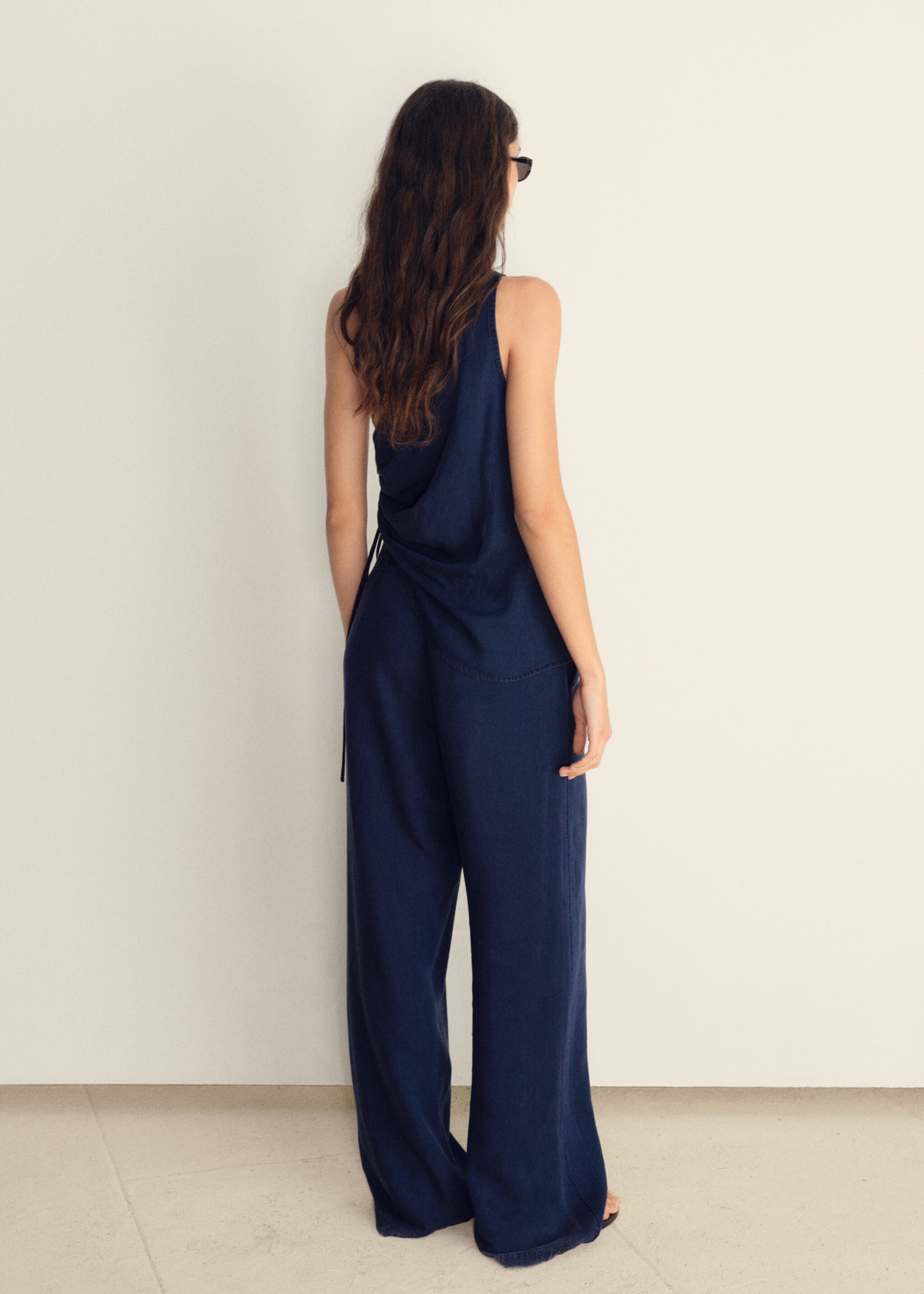 Wide-leg lyocell trousers with pleats - Reverse of the article