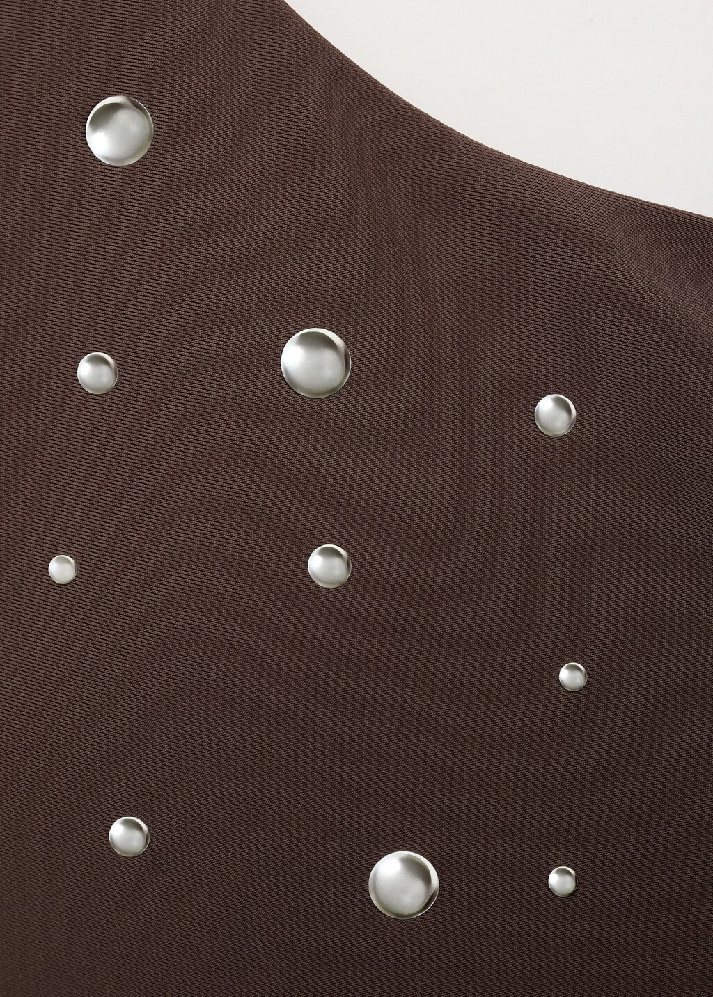 Asymmetrical swimsuit with metallic details