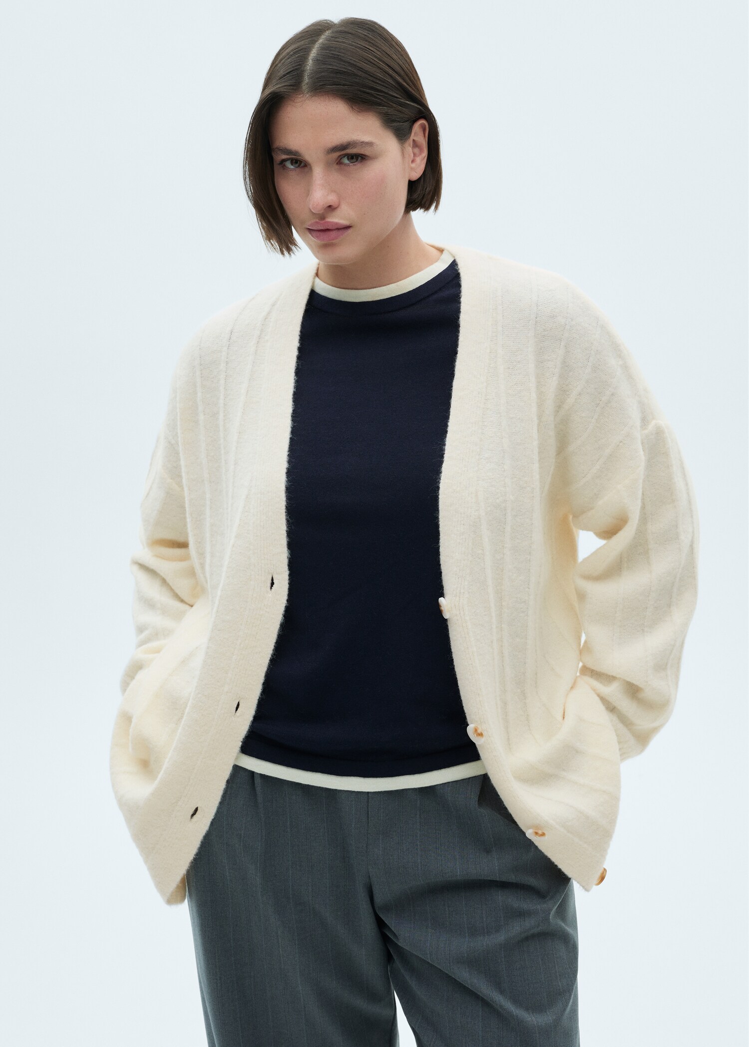 Lang vest met knopen - Detail van het artikel 5