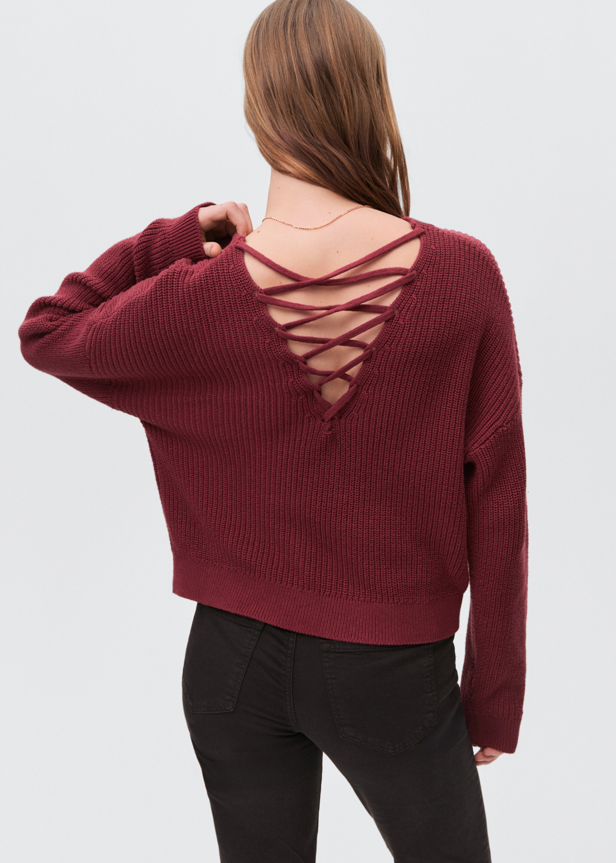Cut-out knitted sweater - Reverse of the article