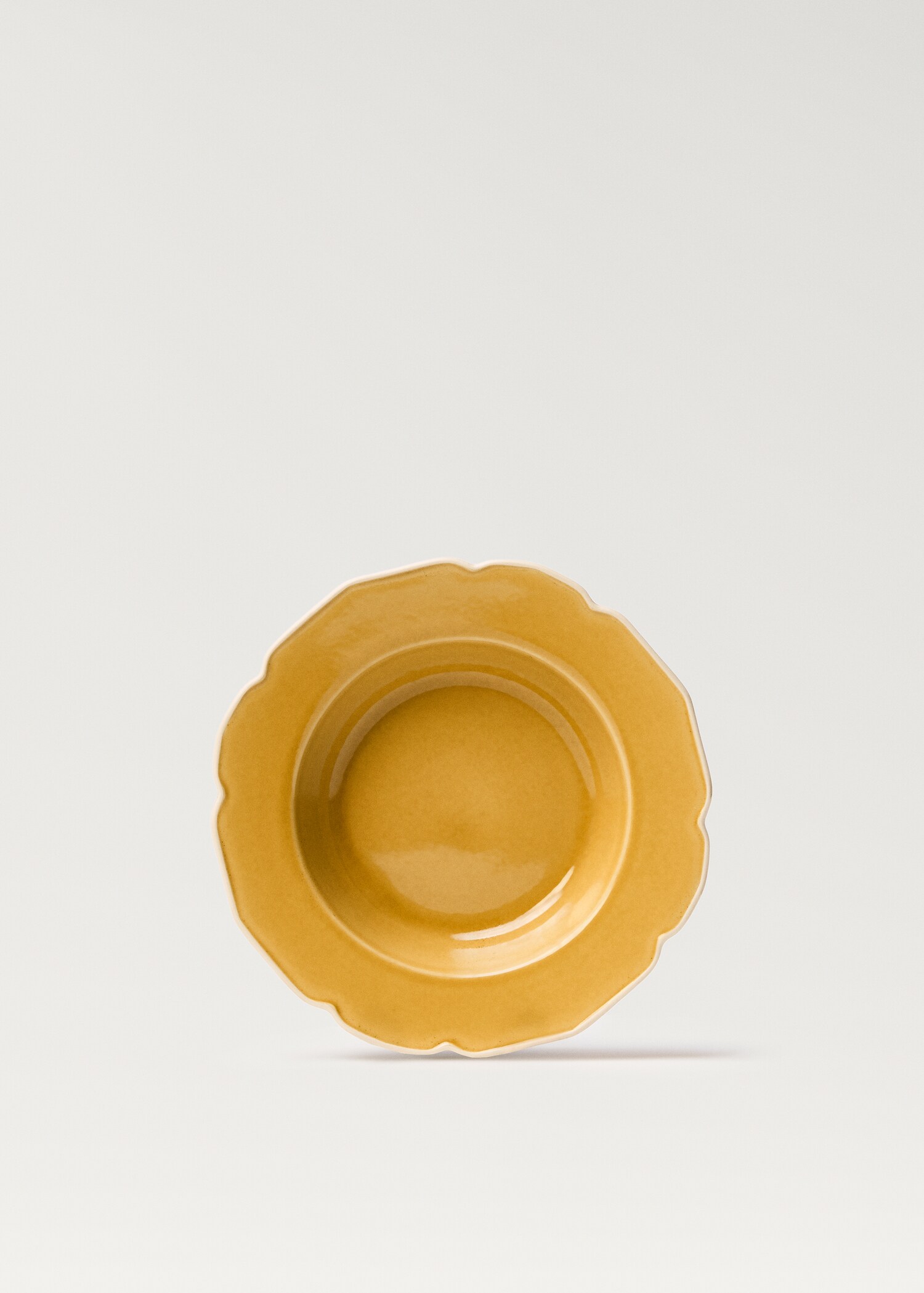 Stoneware deep plate with waves - Article without model