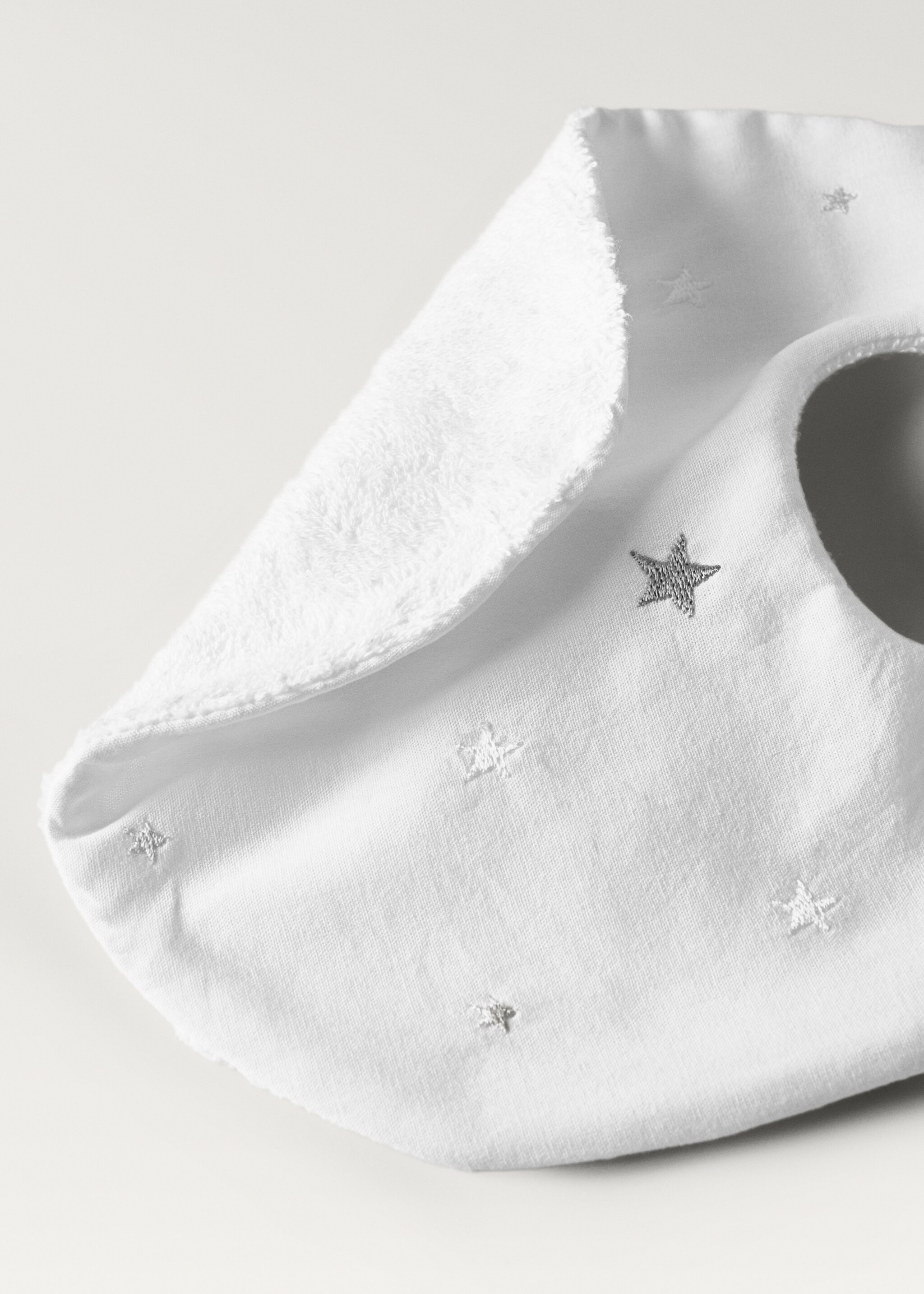 Embroidered terry bib with stars - Details of the article 1