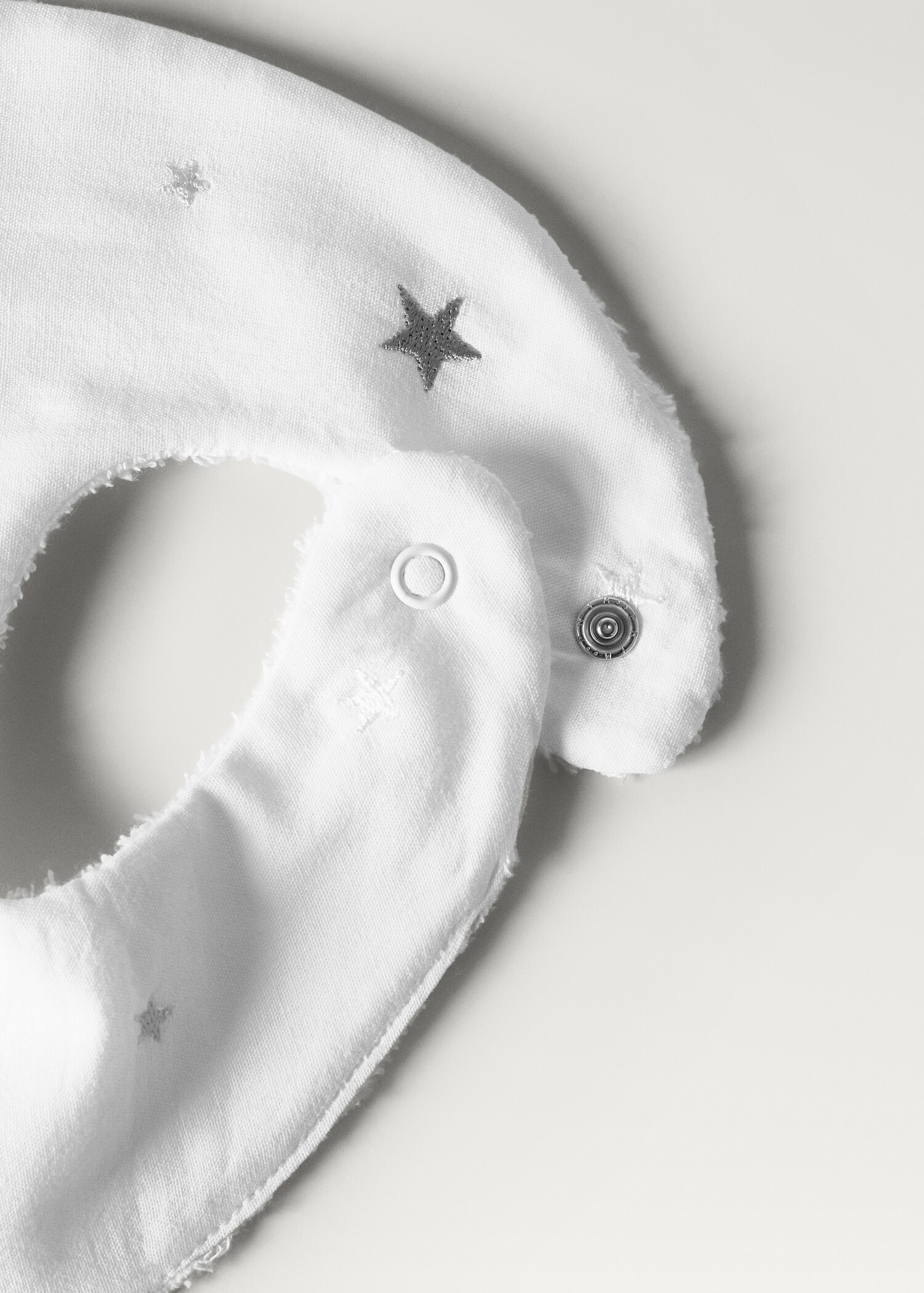 Embroidered terry bib with stars - Details of the article 2