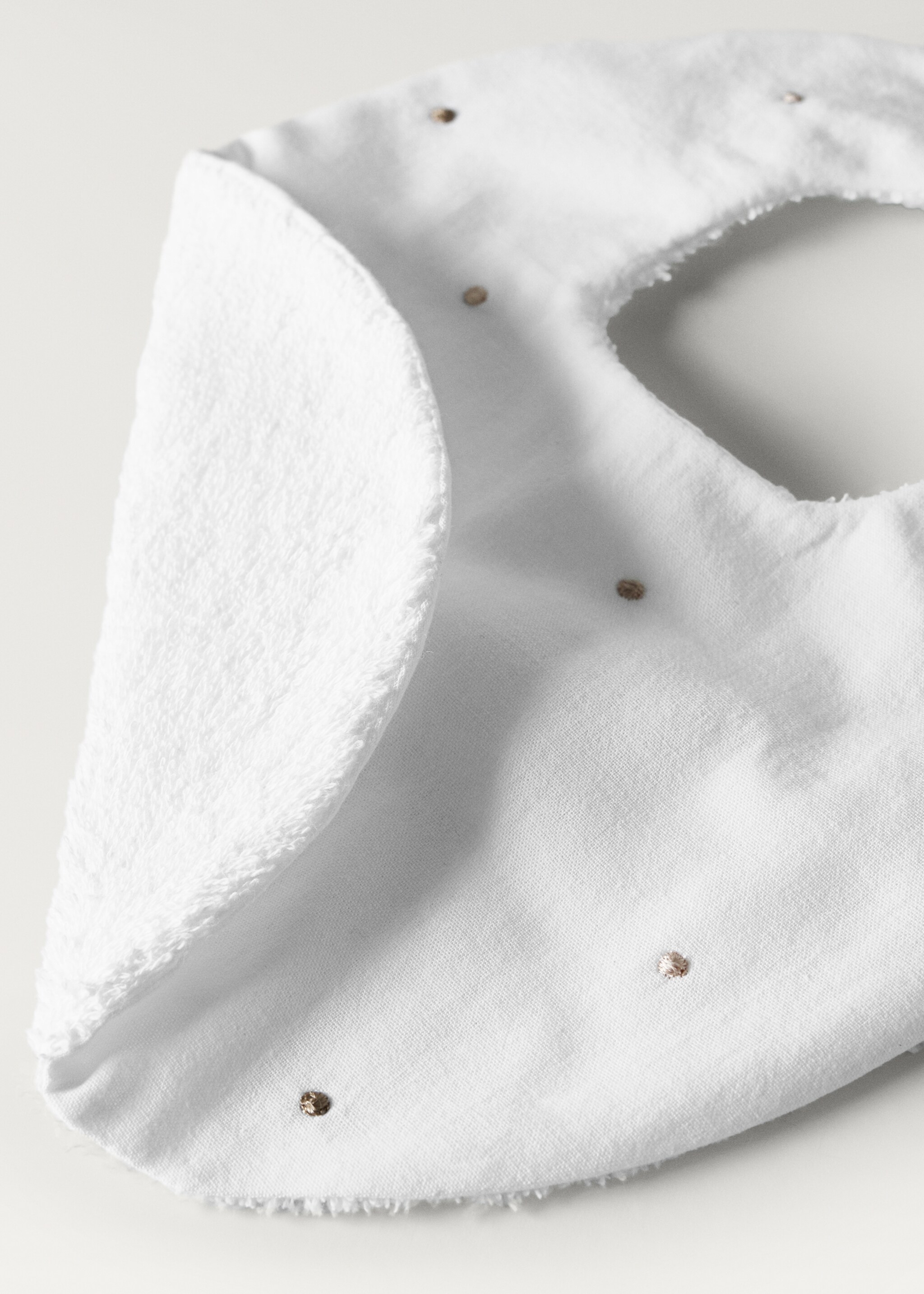 Embroidered terry cloth bib with polka-dots - Details of the article 1