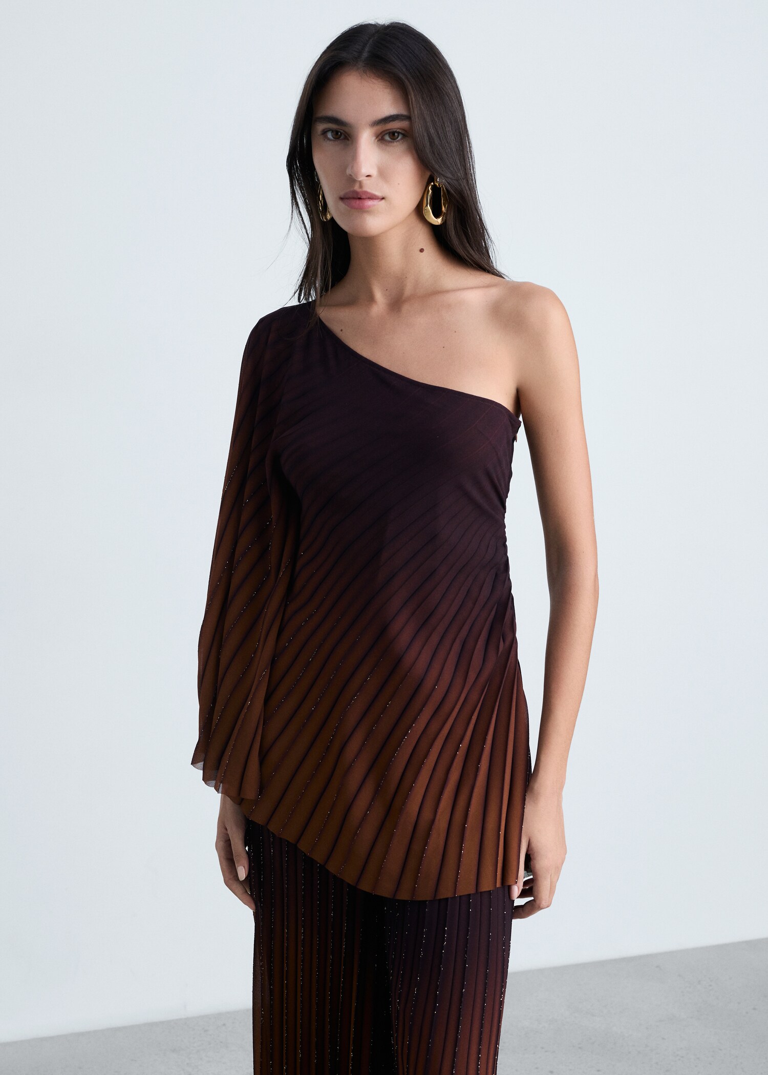 Blusa asimmetrica plissettata - Piano medio