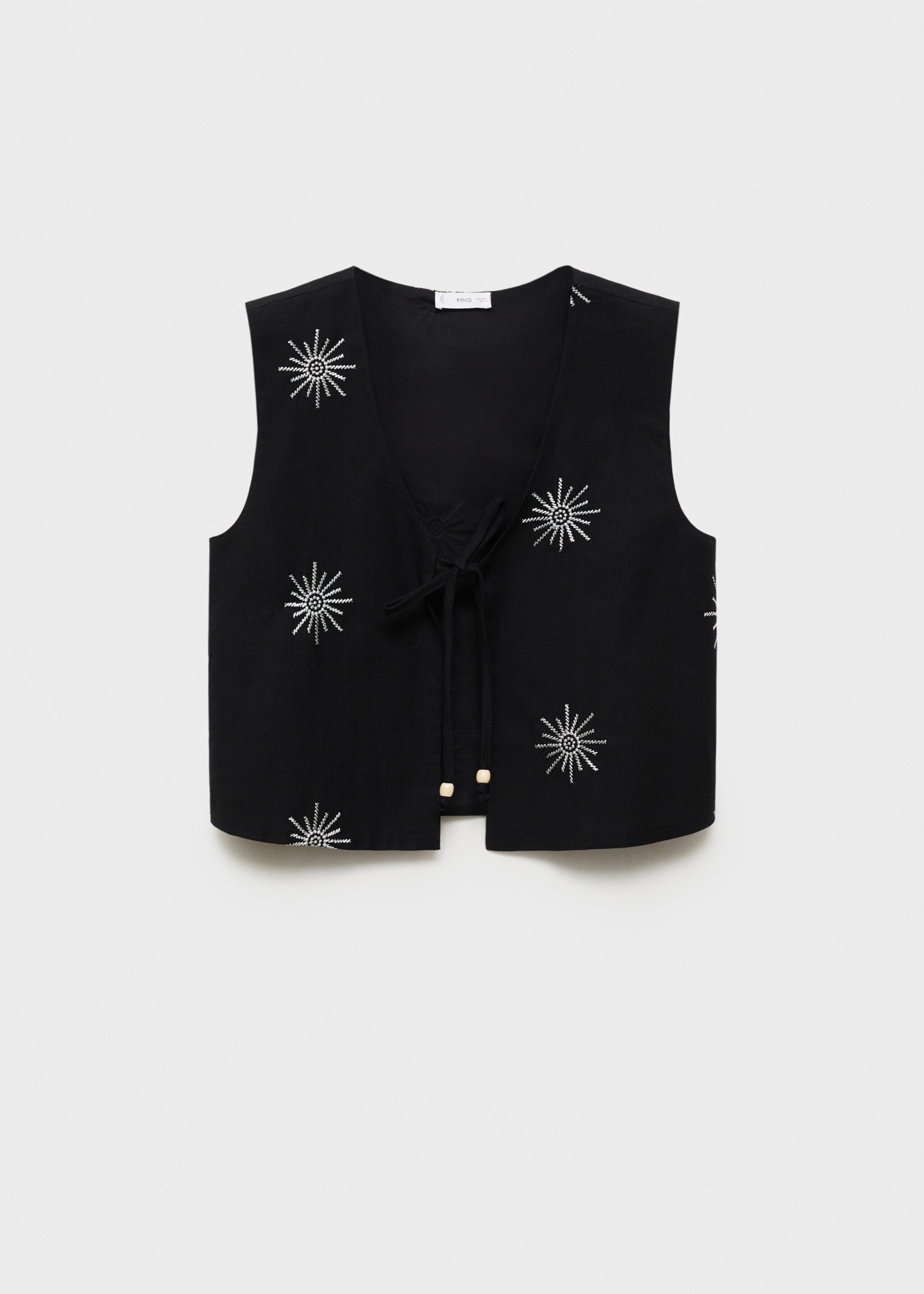 Embroidered top with bow closure - Article without model