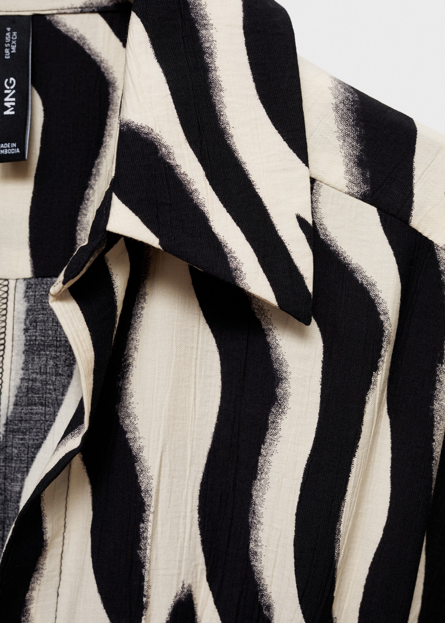 Overhemdjurk met zebraprint - Detail van het artikel 8