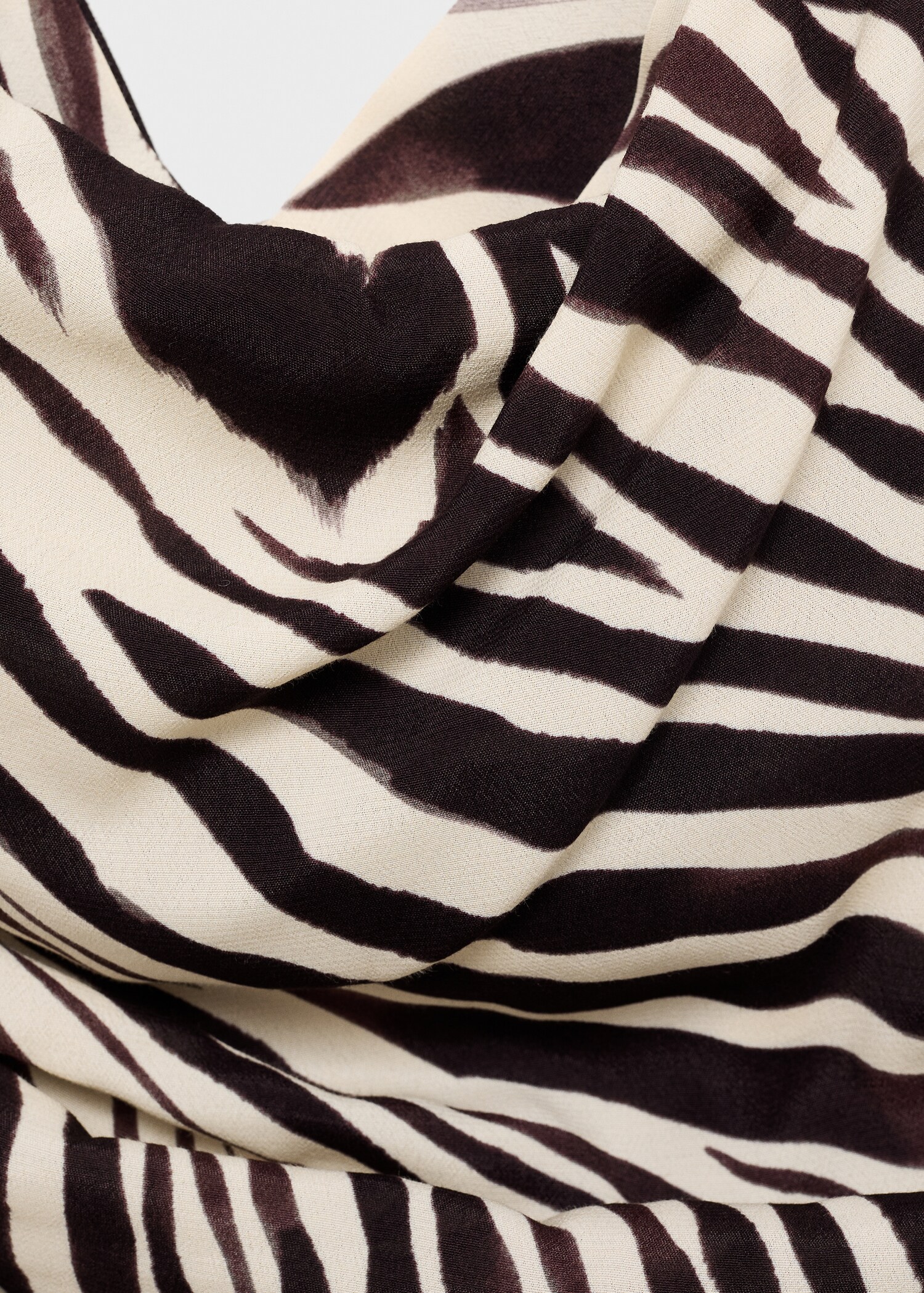 Drapierte Bluse mit Zebramotiv - Detail des Artikels 8