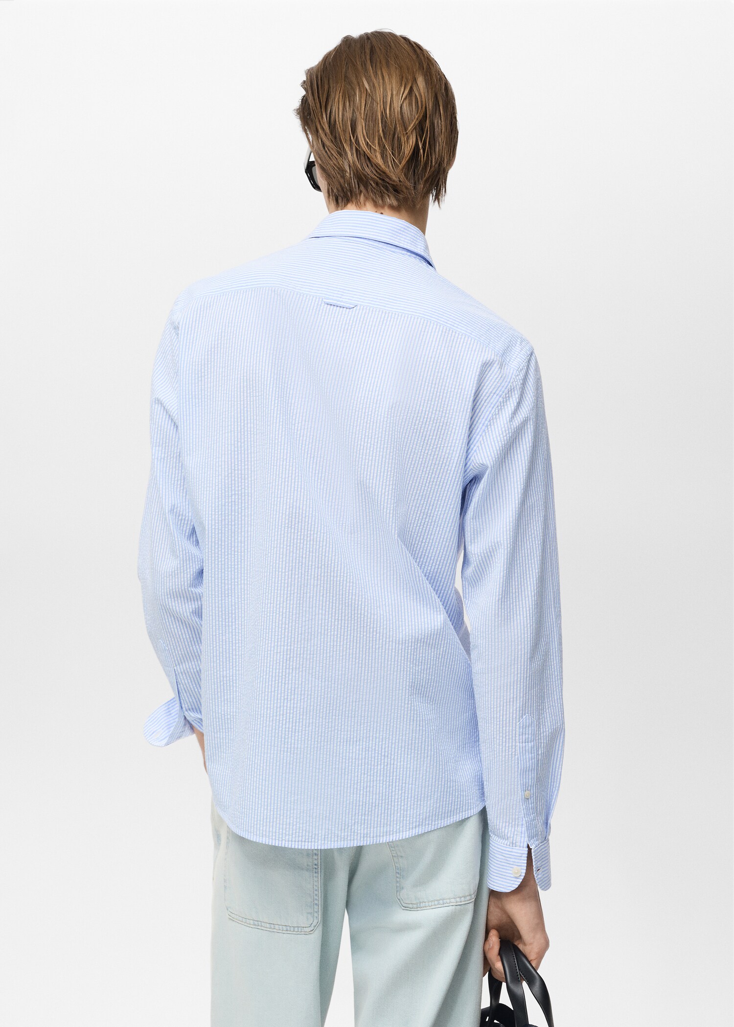 Striped seersucker shirt - Reverse of the article