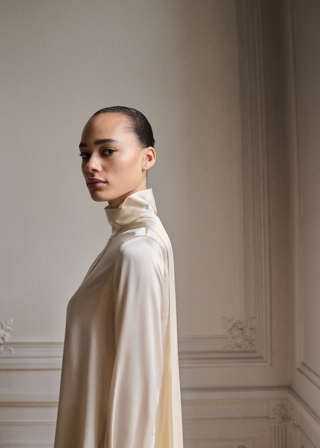 Cape-style silk dress with bow neck