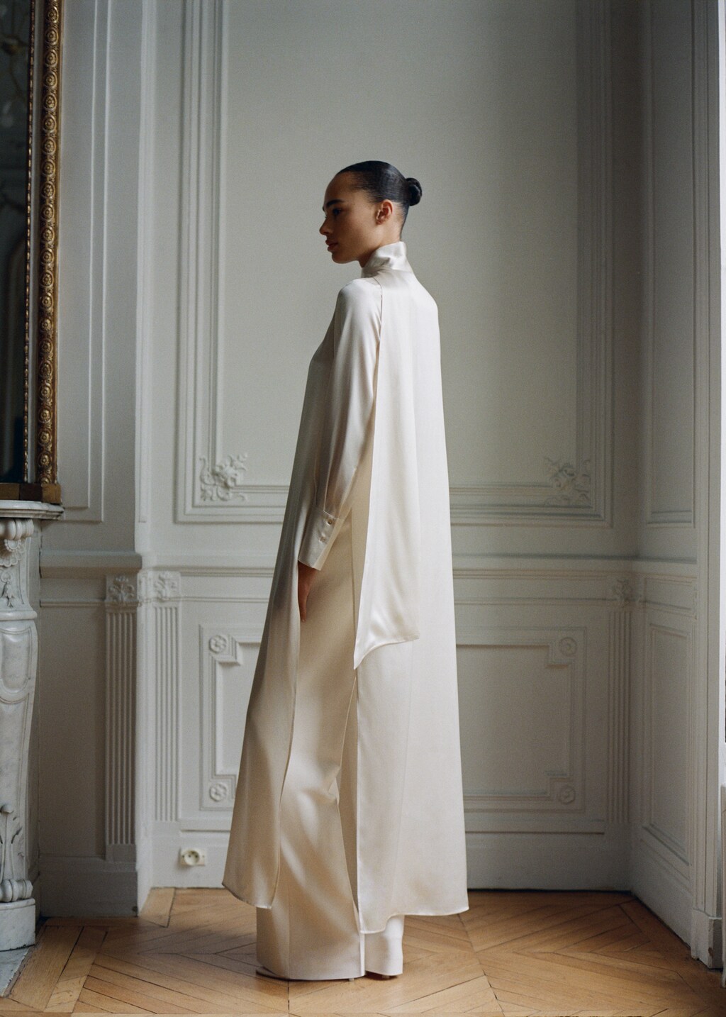 Cape-style silk dress with bow neck