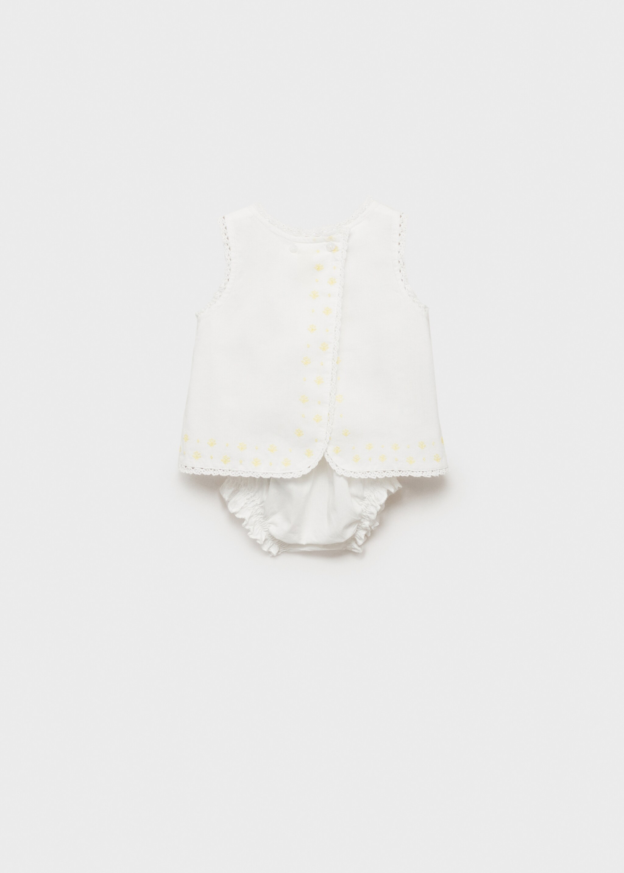 Dress and frog with embroidered details - Reverse of the article