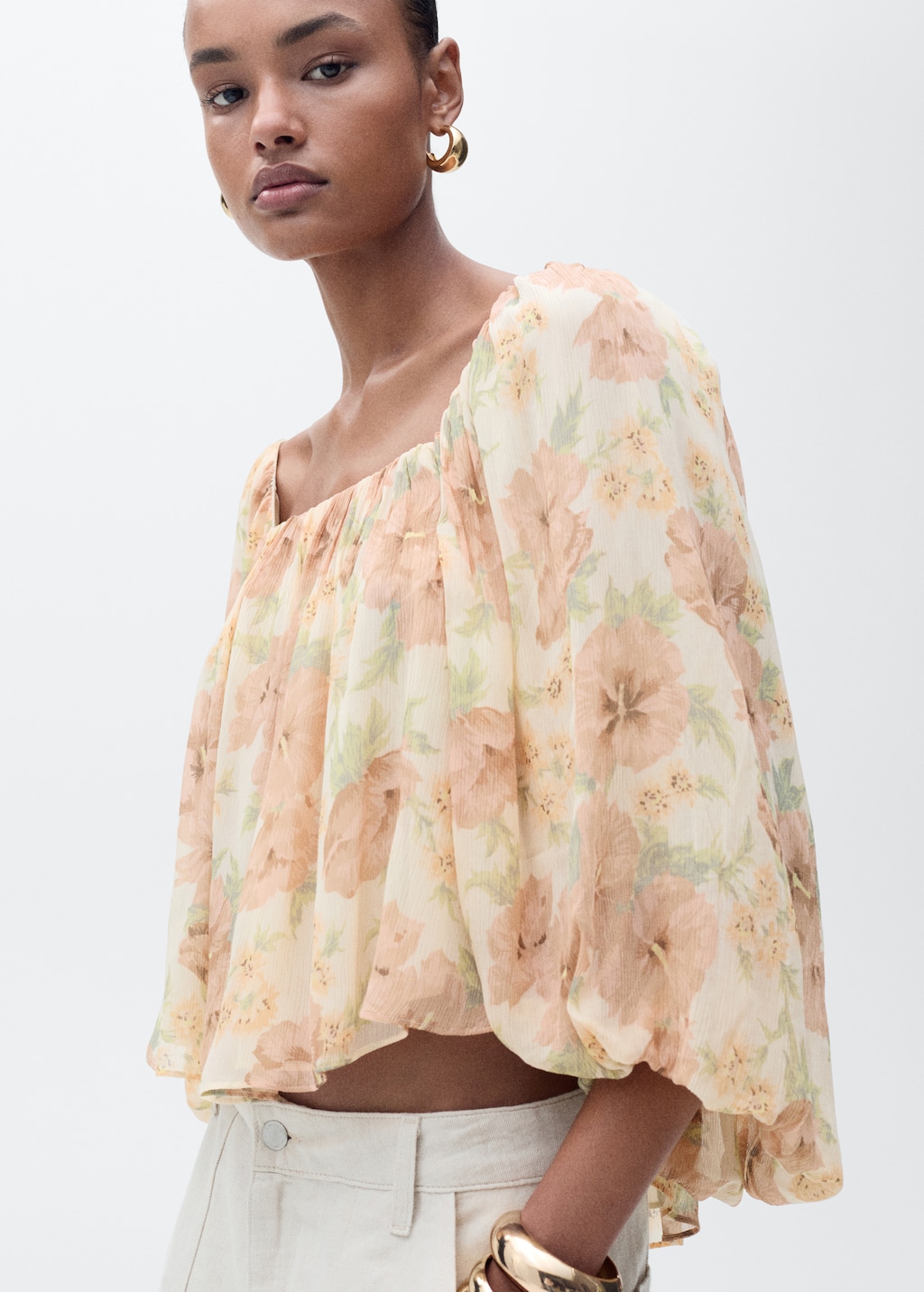 Open-back floral blouse