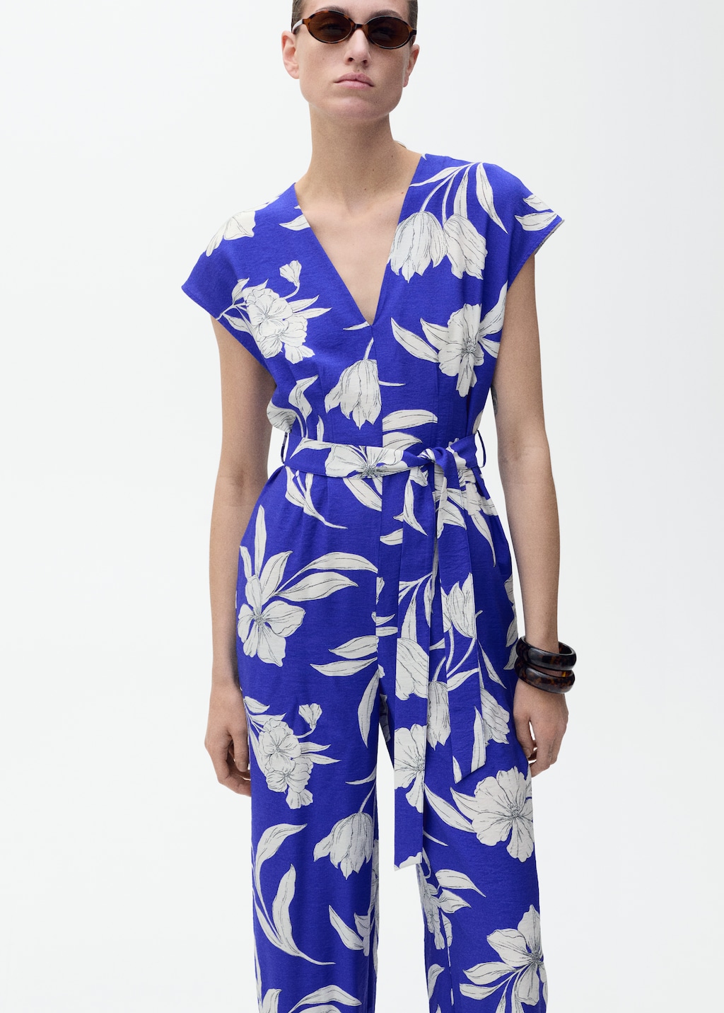 Printed long jumpsuit with belt