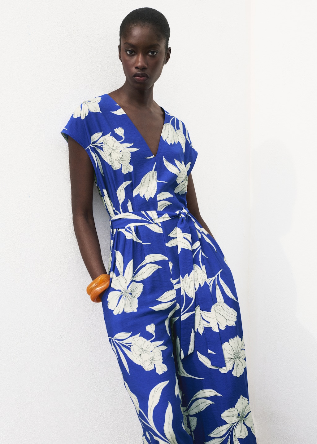 Printed long jumpsuit with belt