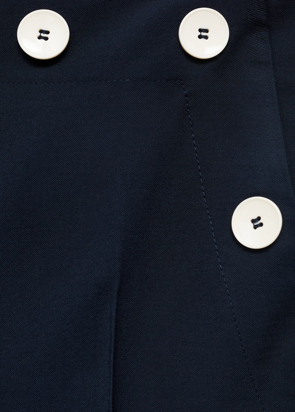 Straight-fit pants with contrasting buttons