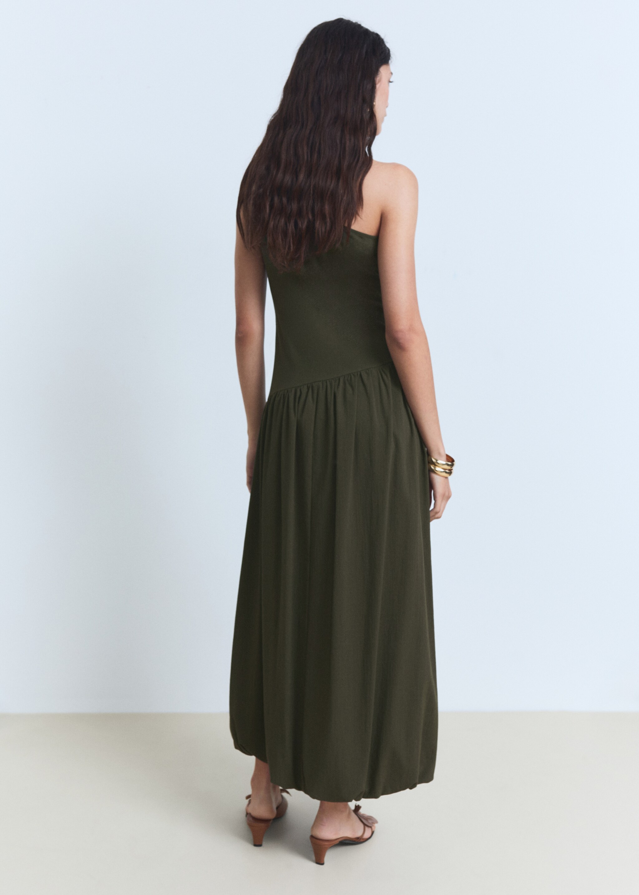 Asymmetrical puffed dress - Reverse of the article