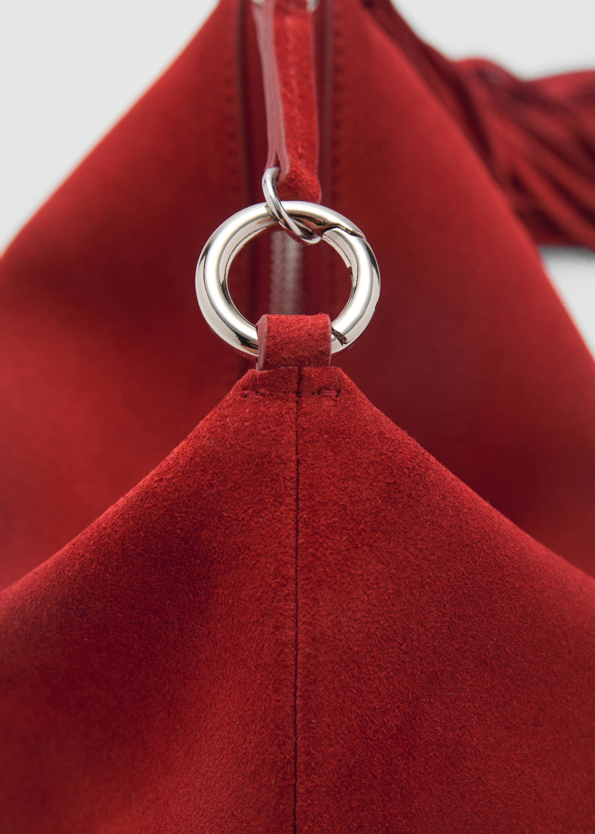 Bolso mano piel flecos - Detalle del artículo 1
