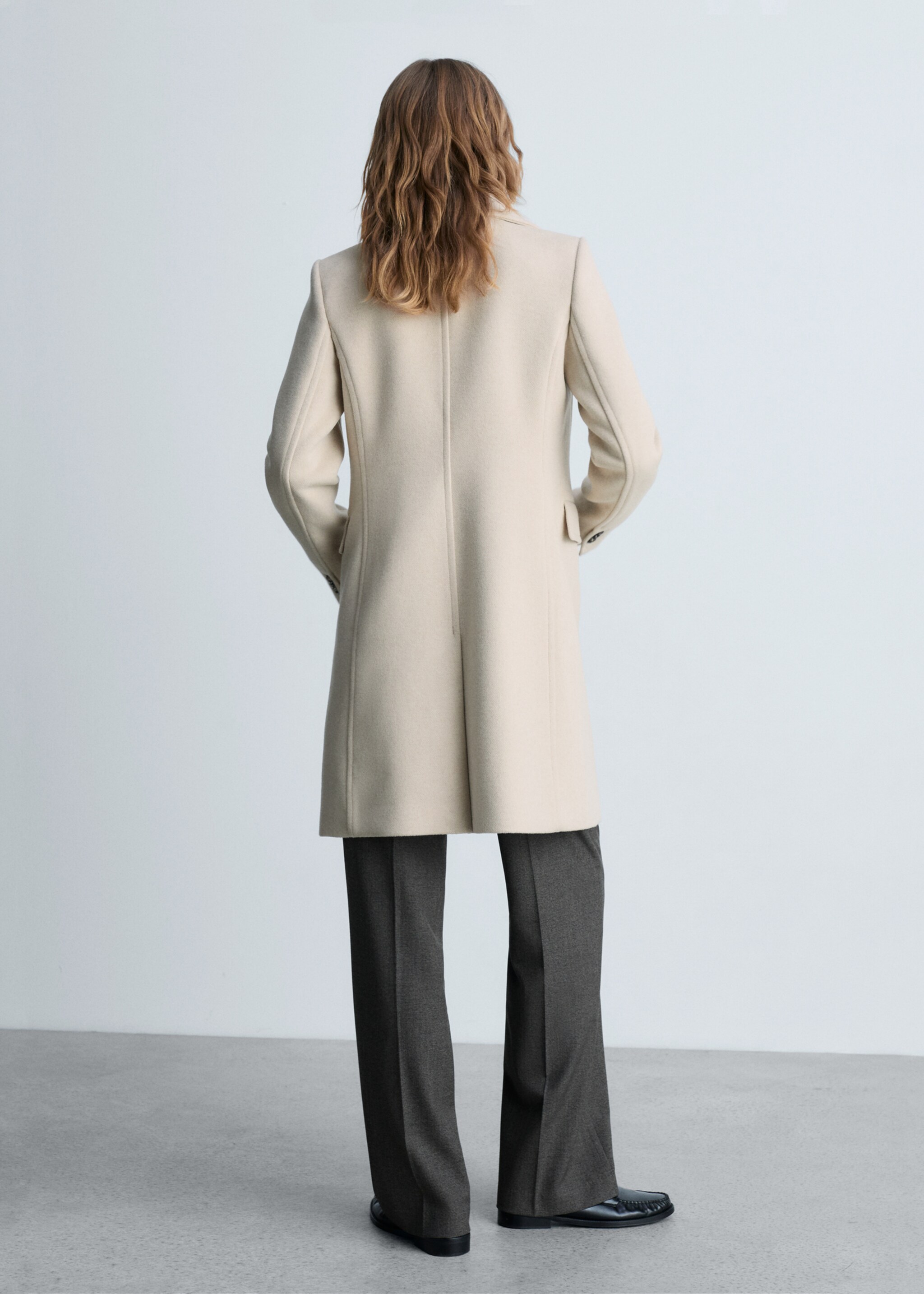 Double-breasted wool coat - Reverse of the article