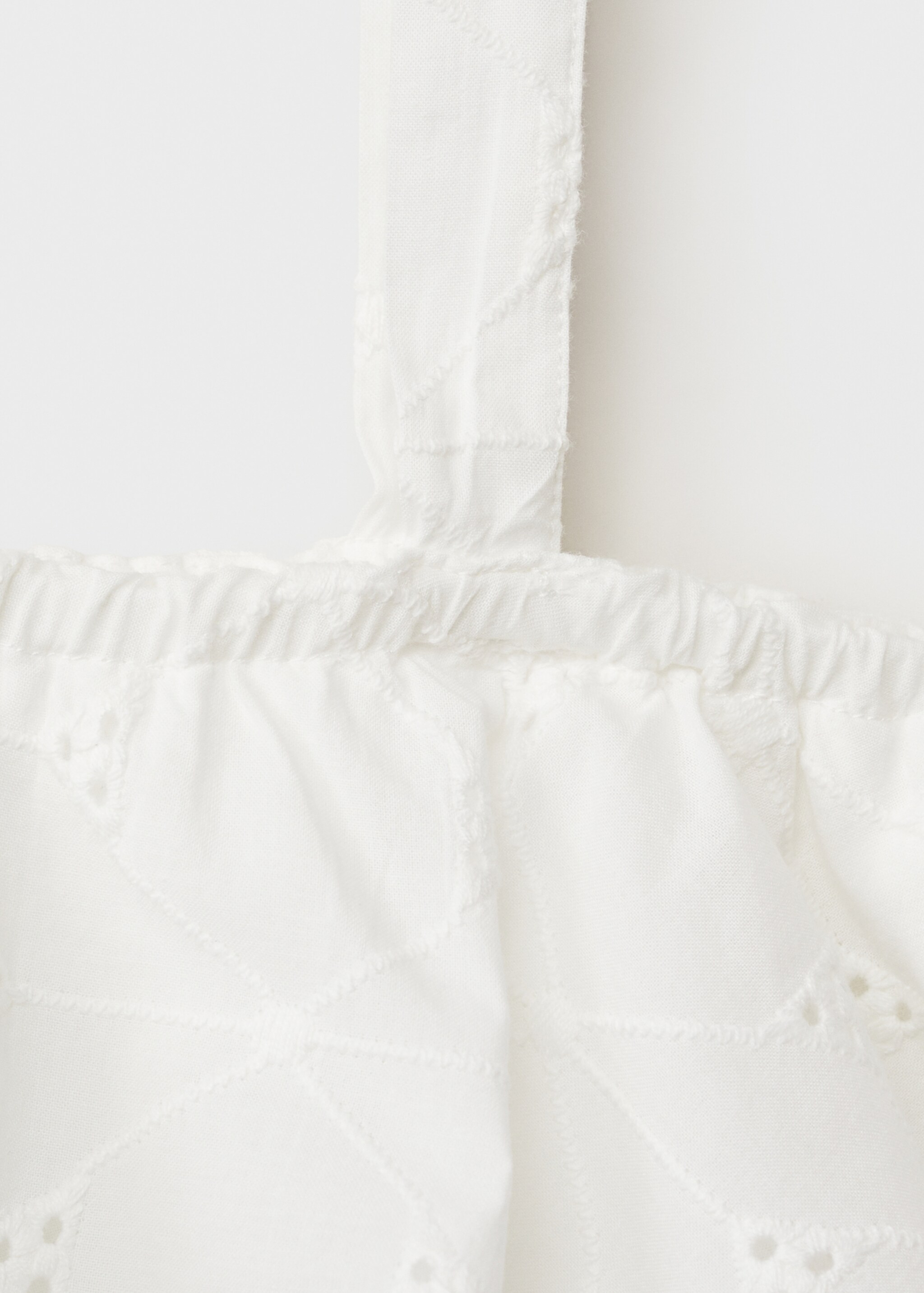Asymmetrische Bluse mit Stickerei - Detail des Artikels 0