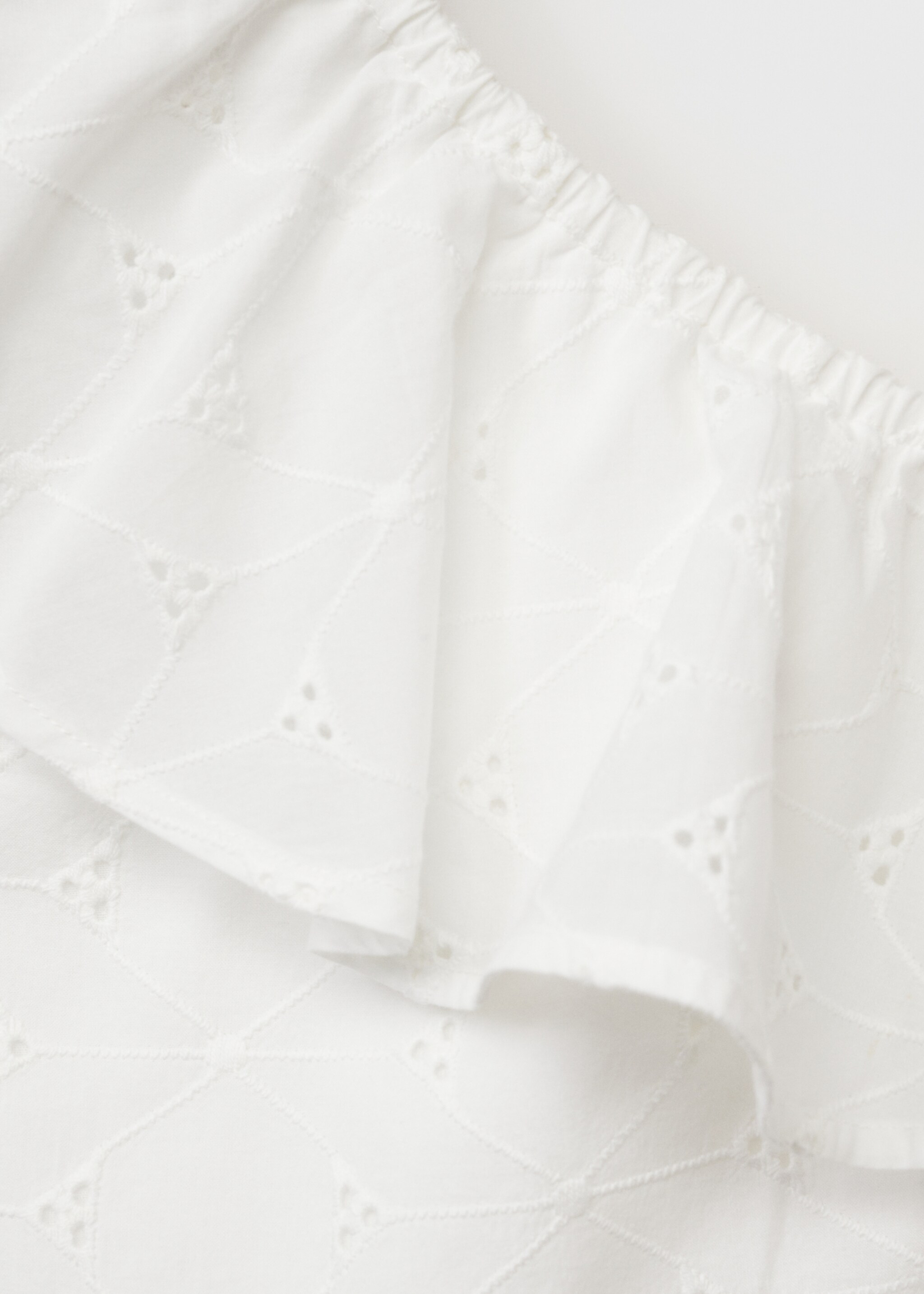 Asymmetrische Bluse mit Stickerei - Detail des Artikels 8