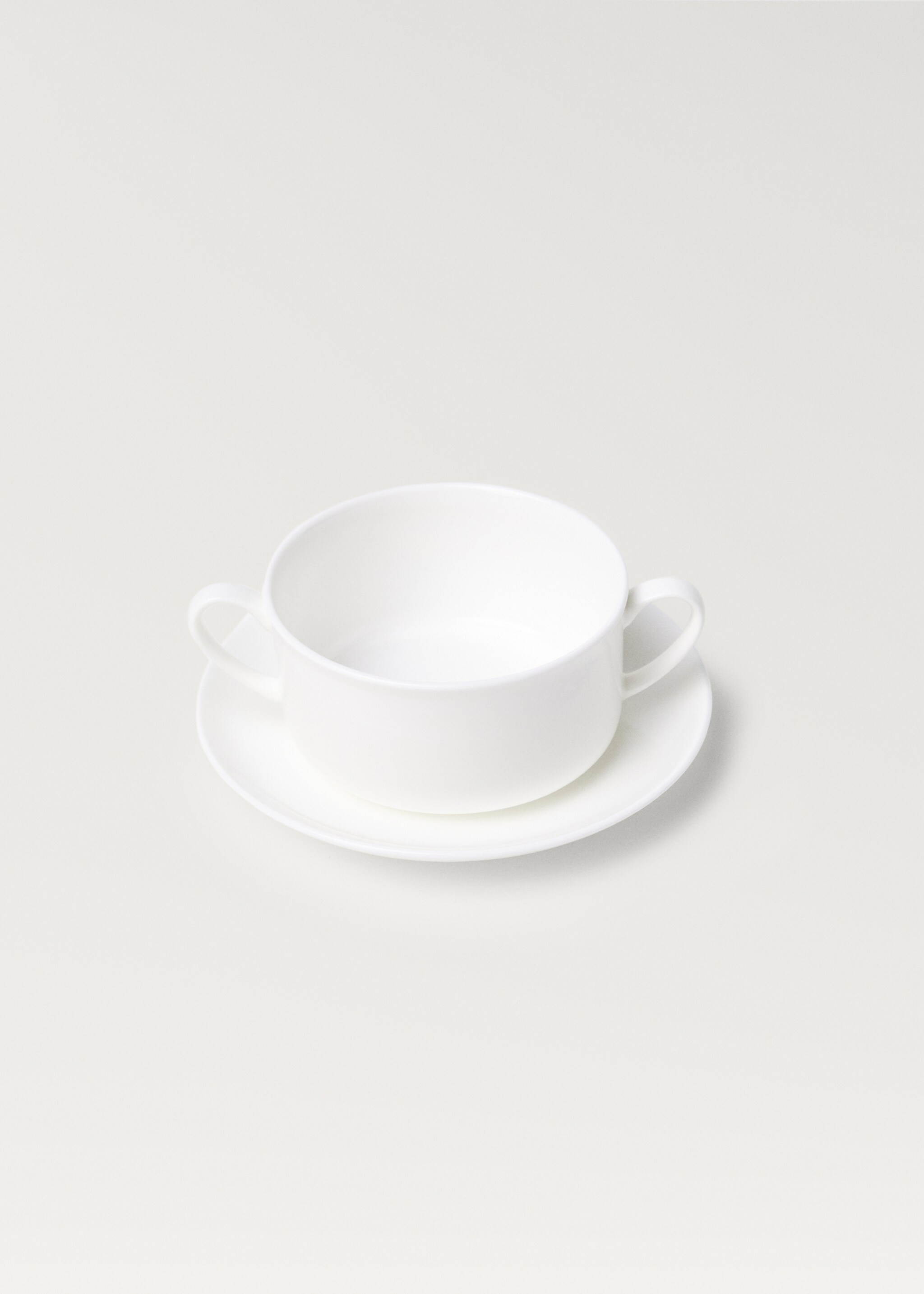 Велика чашка та блюдце з кераміки Bone China - Детальніше про товар 1