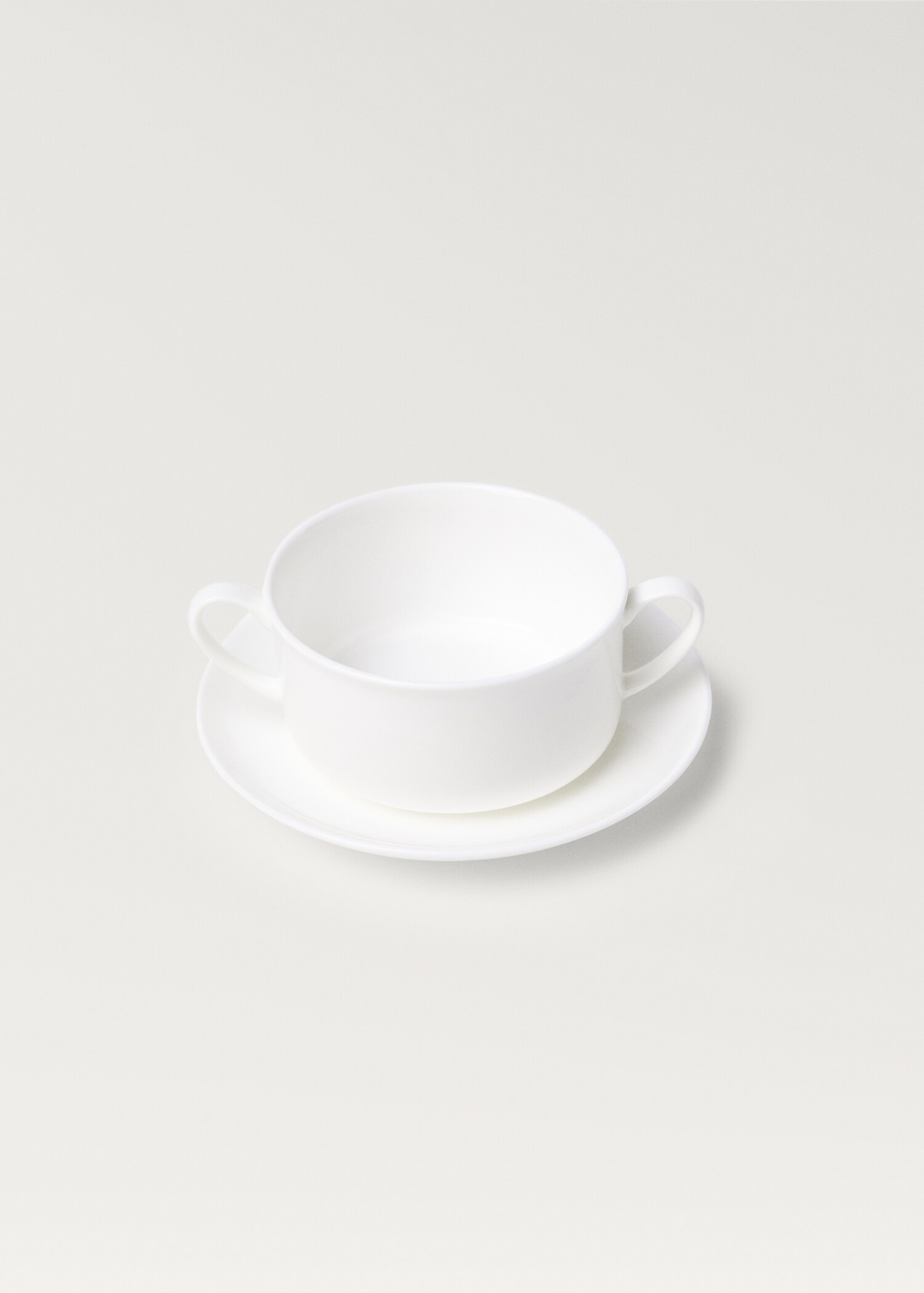 Велика чашка та блюдце з кераміки Bone China - Детальніше про товар 1