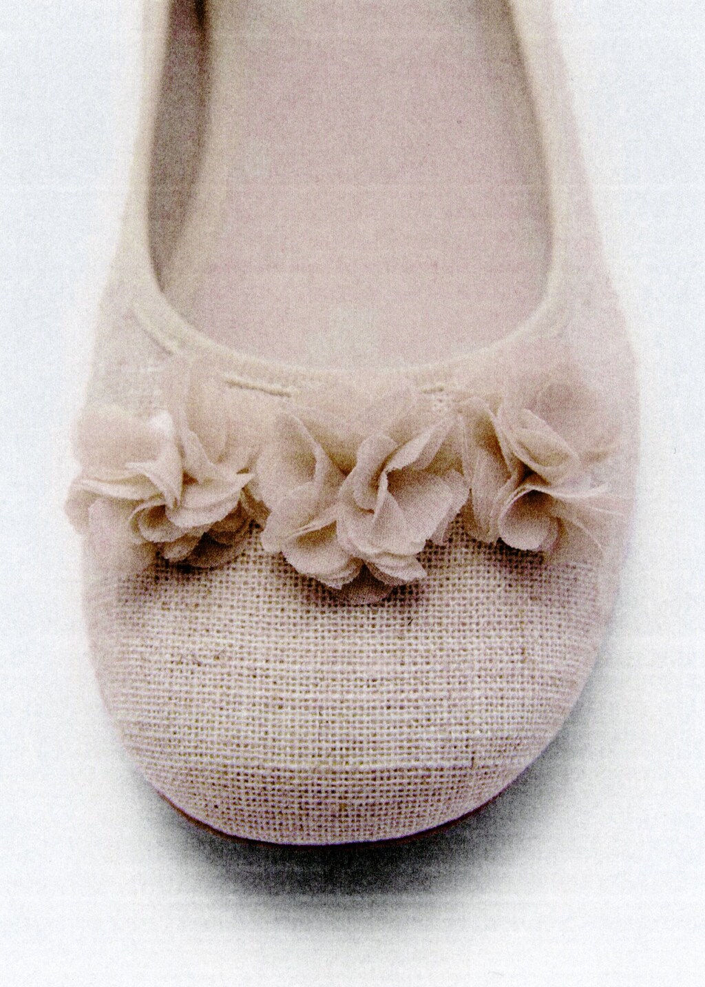 Ballet flats with flower embellishment