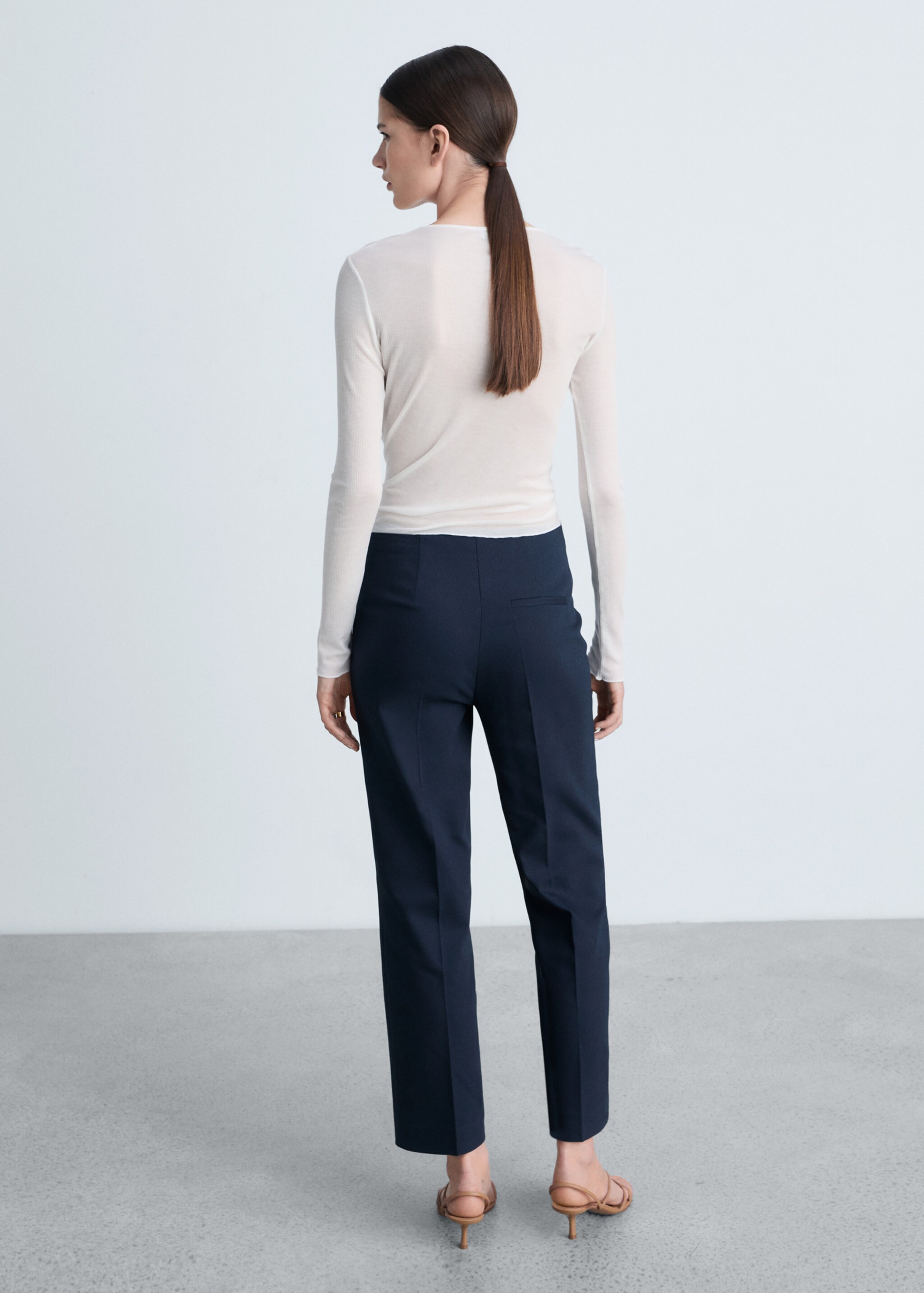 Straight trousers with jewel buttons - Reverse of the article