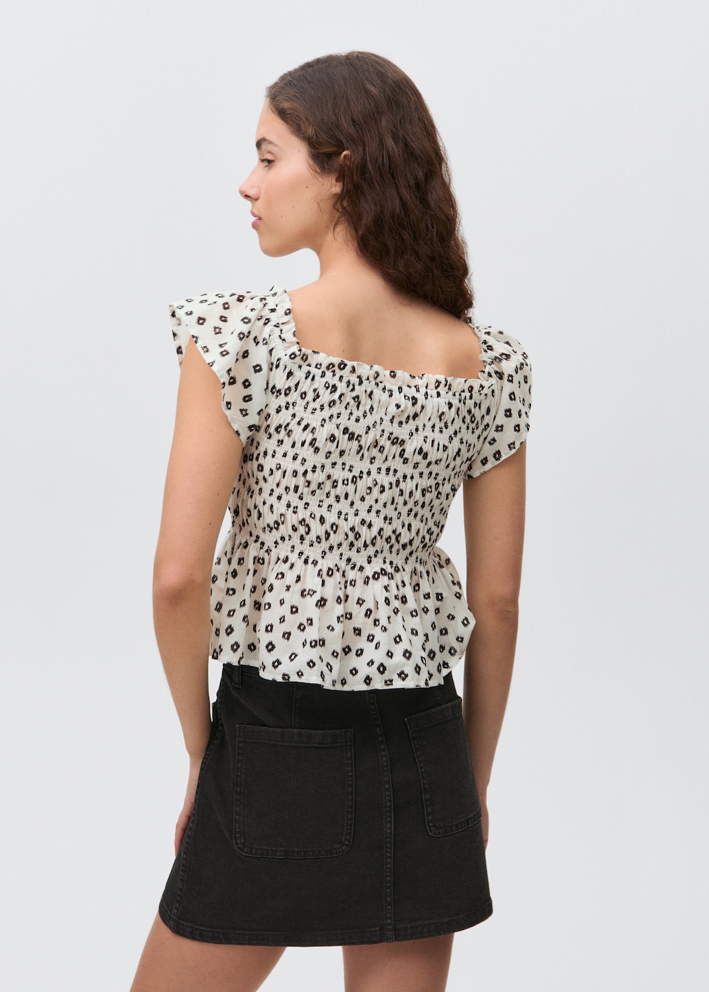 Denim mini-skirt with pockets