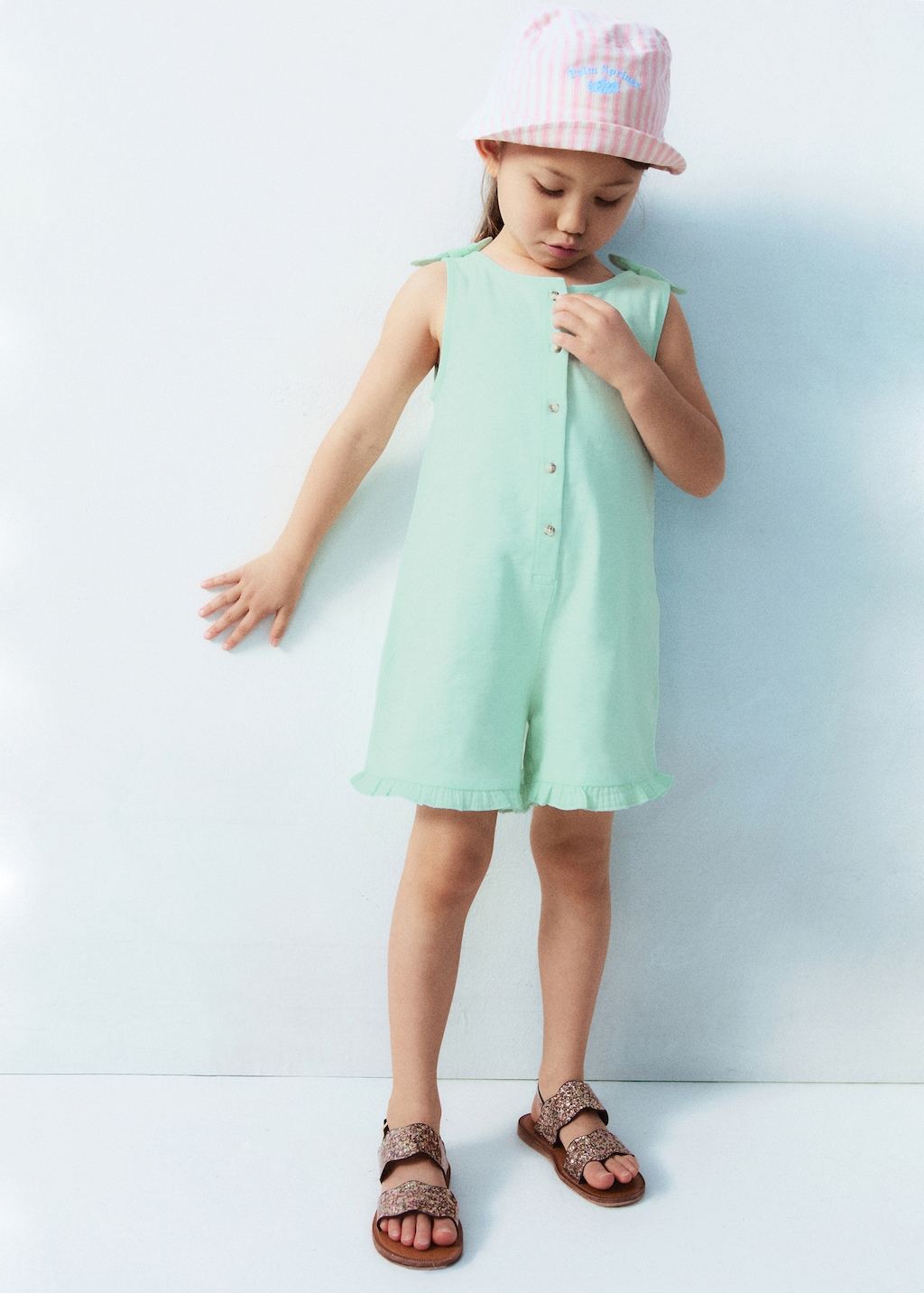 Short jumpsuit with bow detail