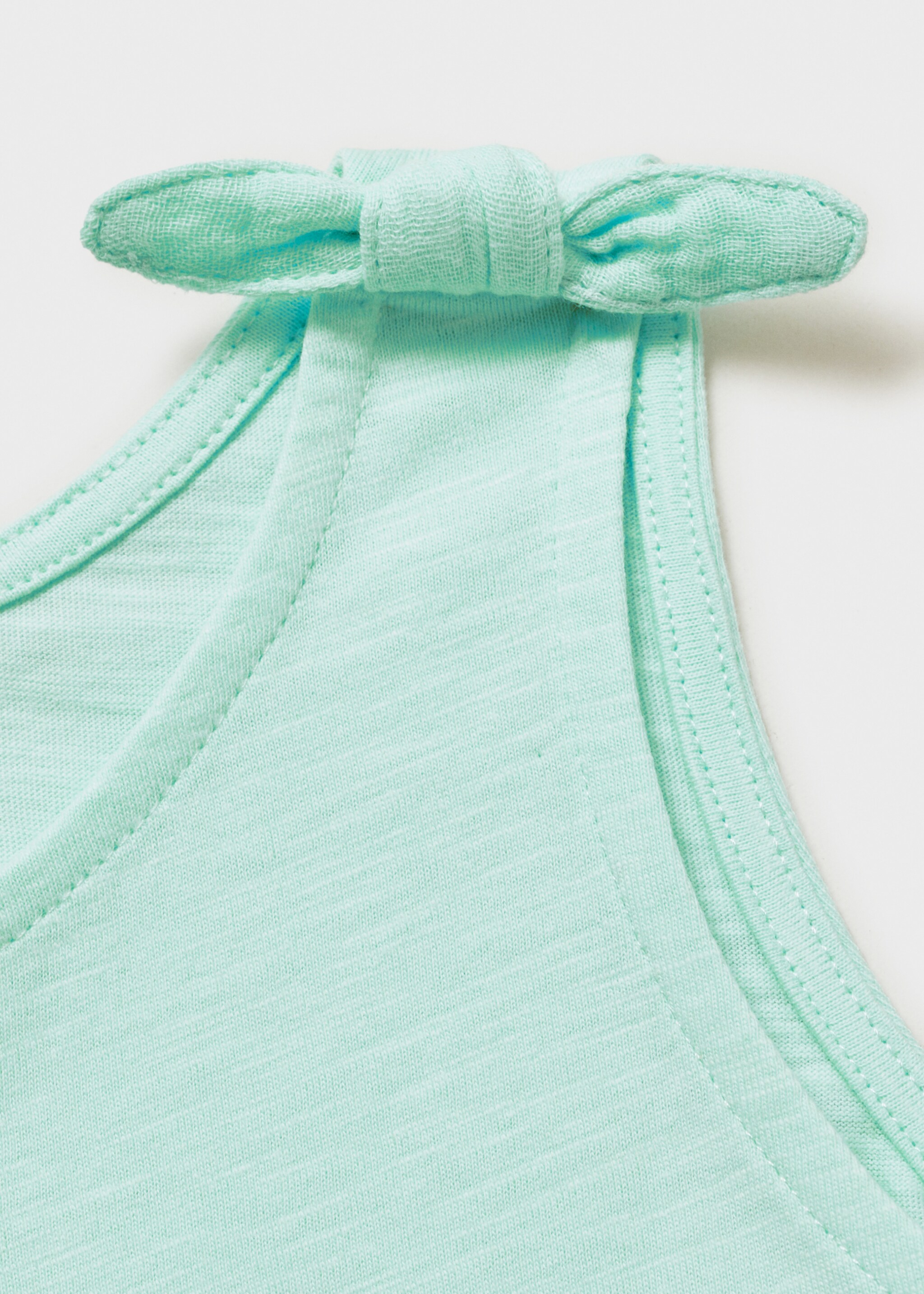Short jumpsuit with bow detail - Details of the article 8