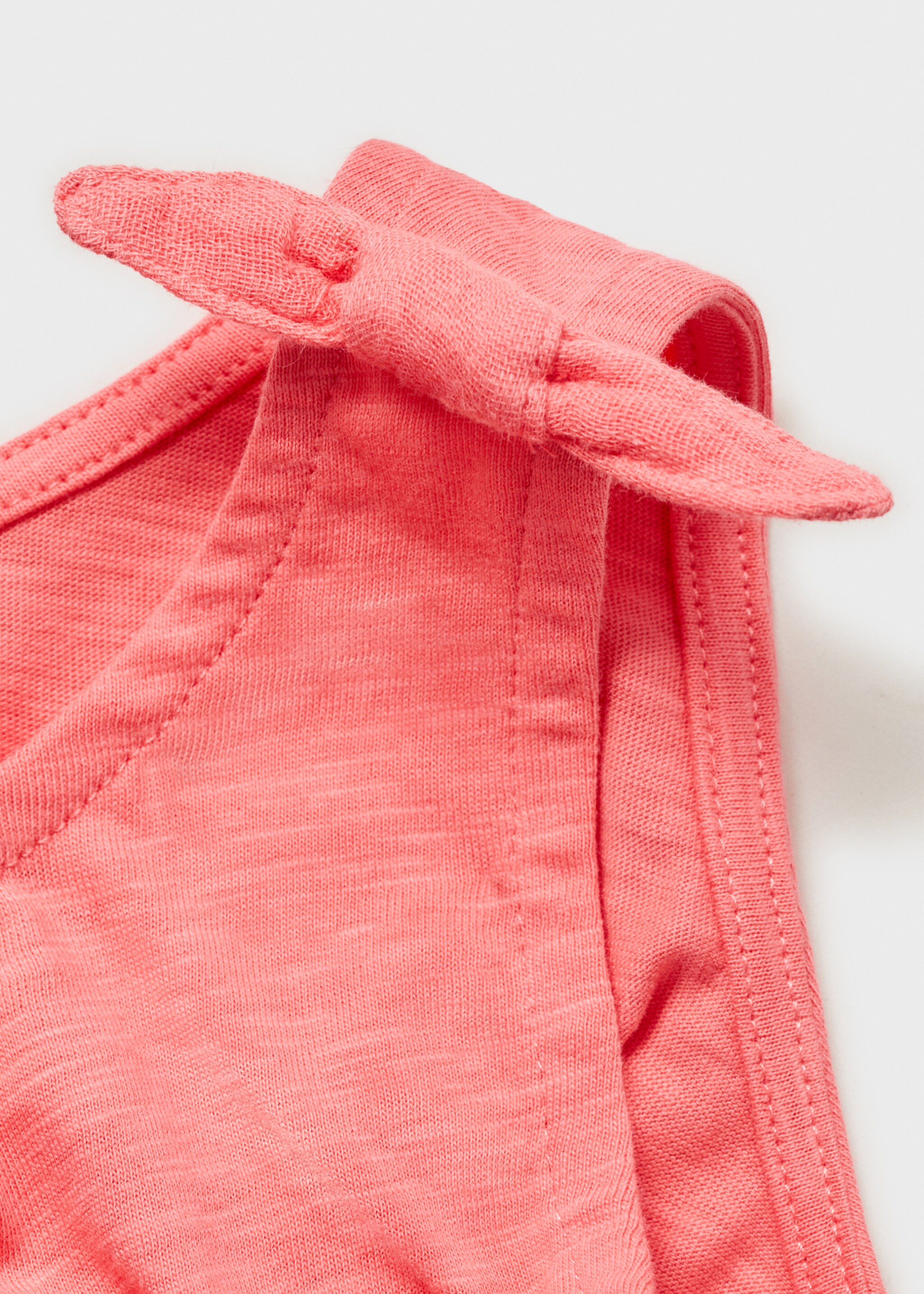 Short jumpsuit with bow detail - Details of the article 0
